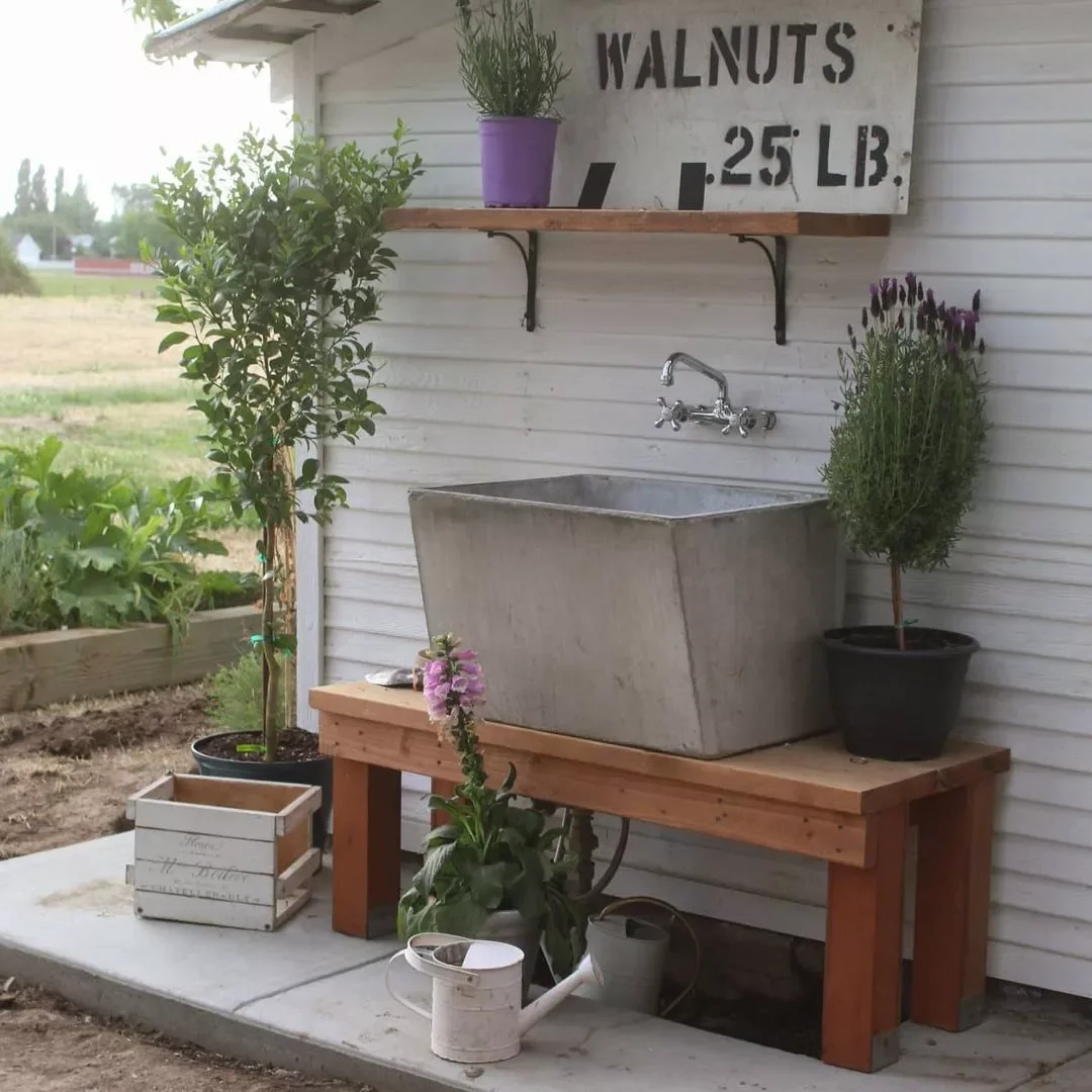 12 Brilliant Outdoor Sink Ideas That Will Transform Your Backyard 2 Hang a Shelf Above the Sink