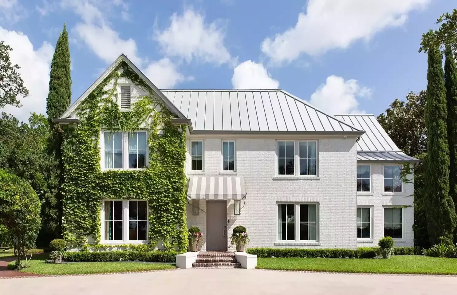 39 Stunning Front Door Decor Ideas to Welcome Every Season Hang a Striped Awning