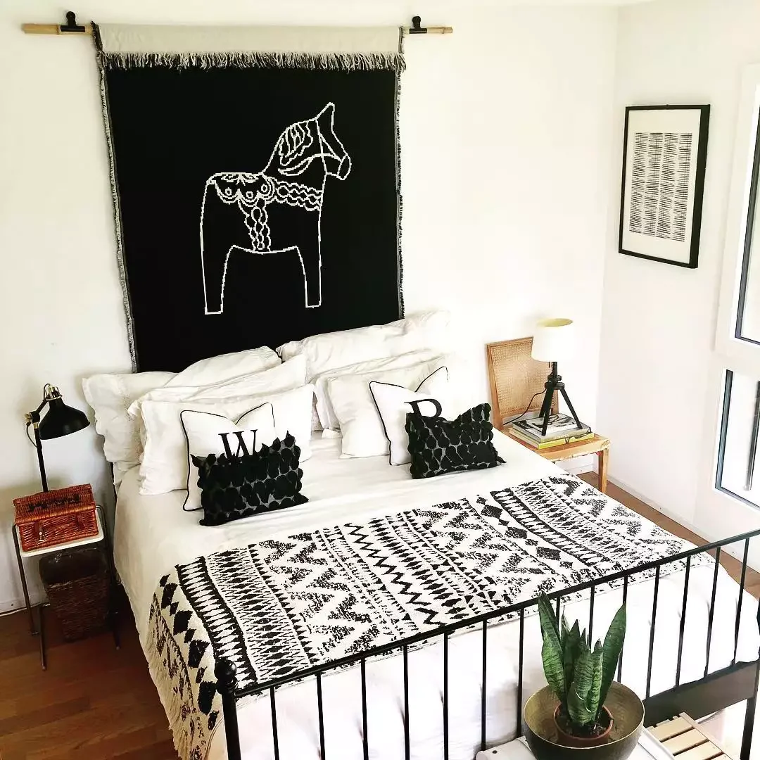 32 Stunning Black and White Bedroom Ideas That Will Transform Your Space 16 Hang a Tapestry