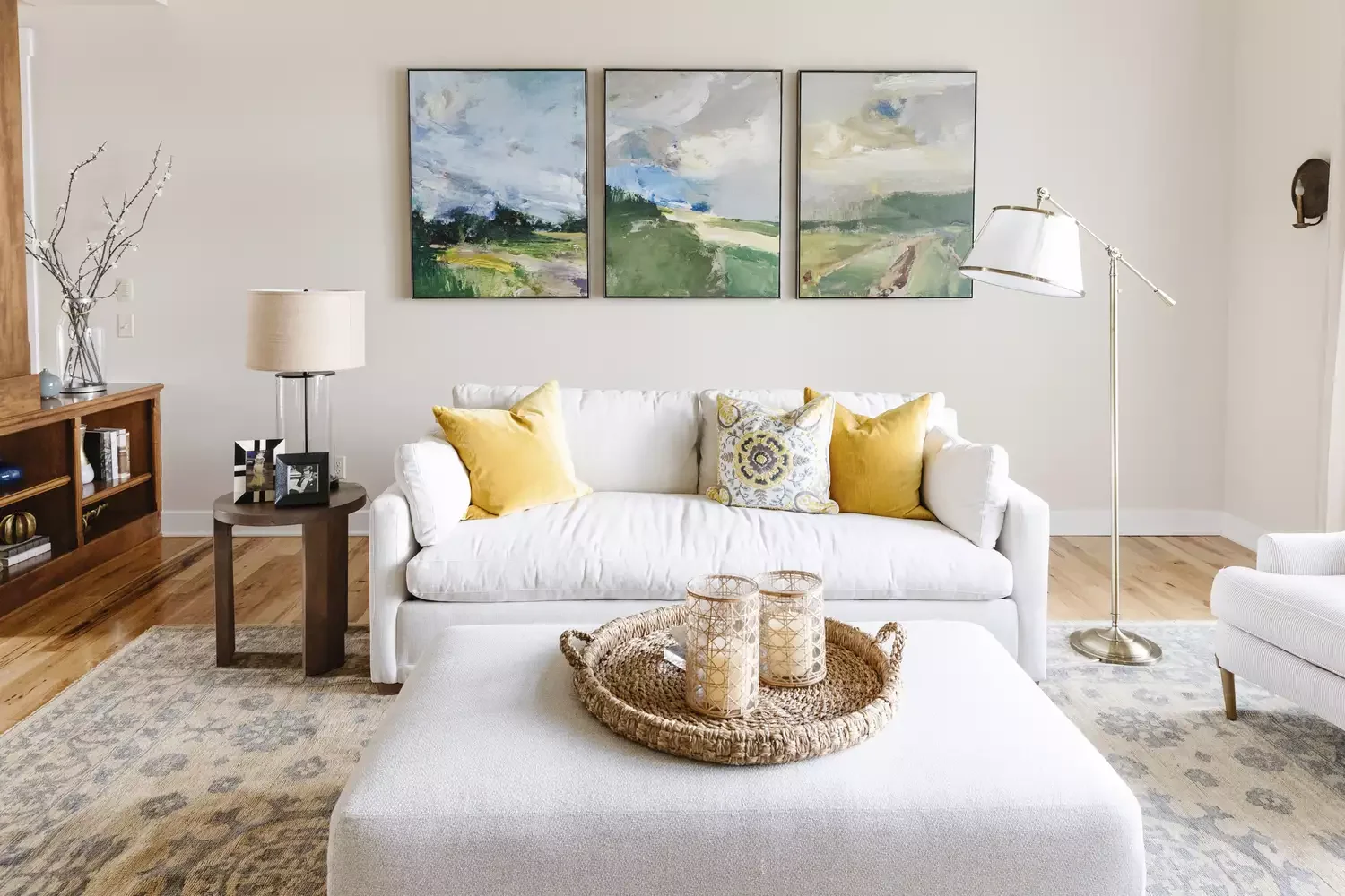 30 Statement-Making Living Room Wall Art Ideas That Transform Your Space 3 Hang a Triptych
