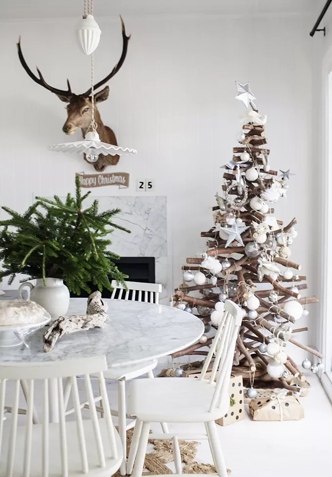 56 Magical Christmas Mantel Decorating Ideas to Transform Your Holiday Home 35 Hang a Trophy Head