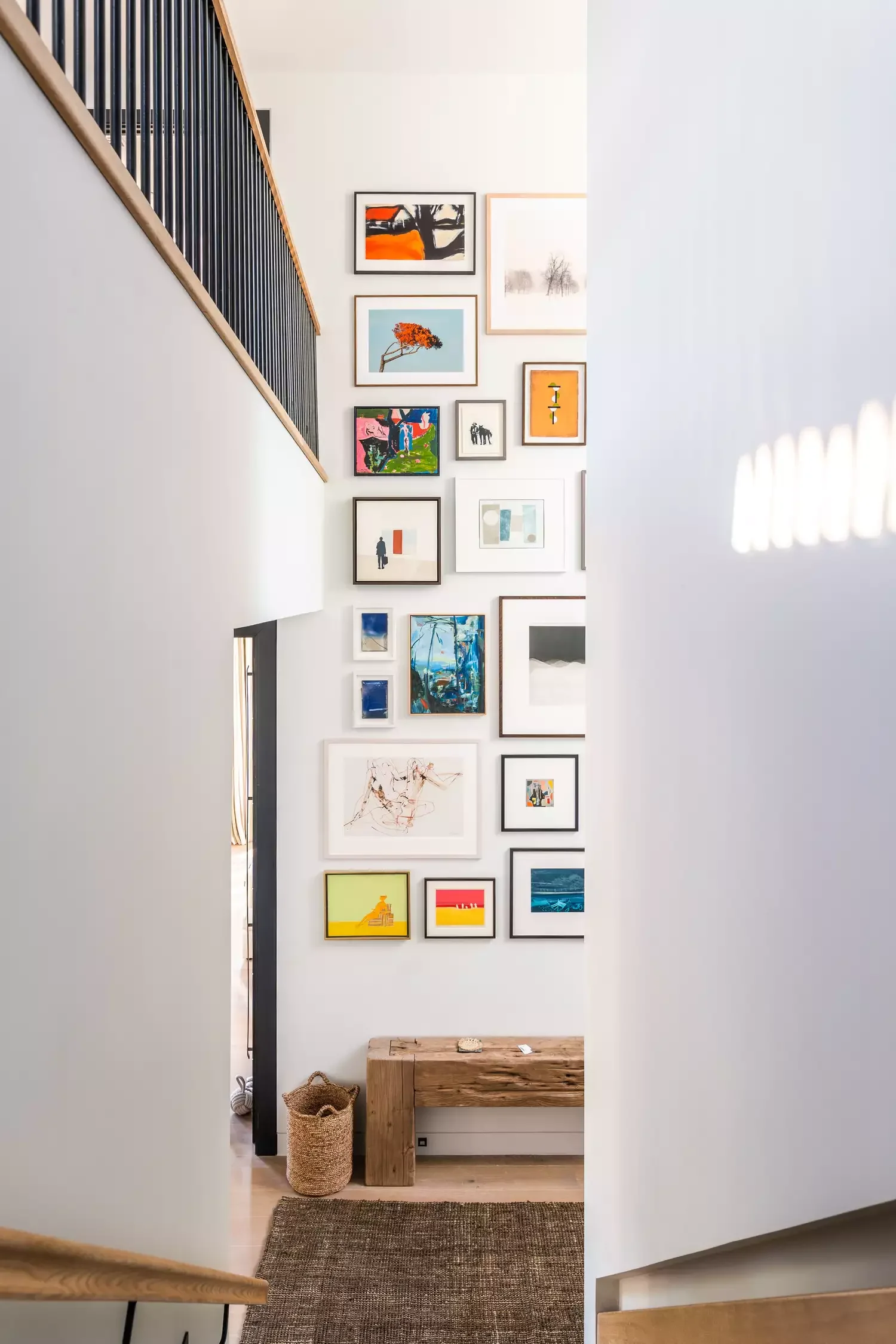 31 Brilliant Small Entryway Ideas That'll Make Your Space Feel Amazing Hang a Vertical Gallery Wall