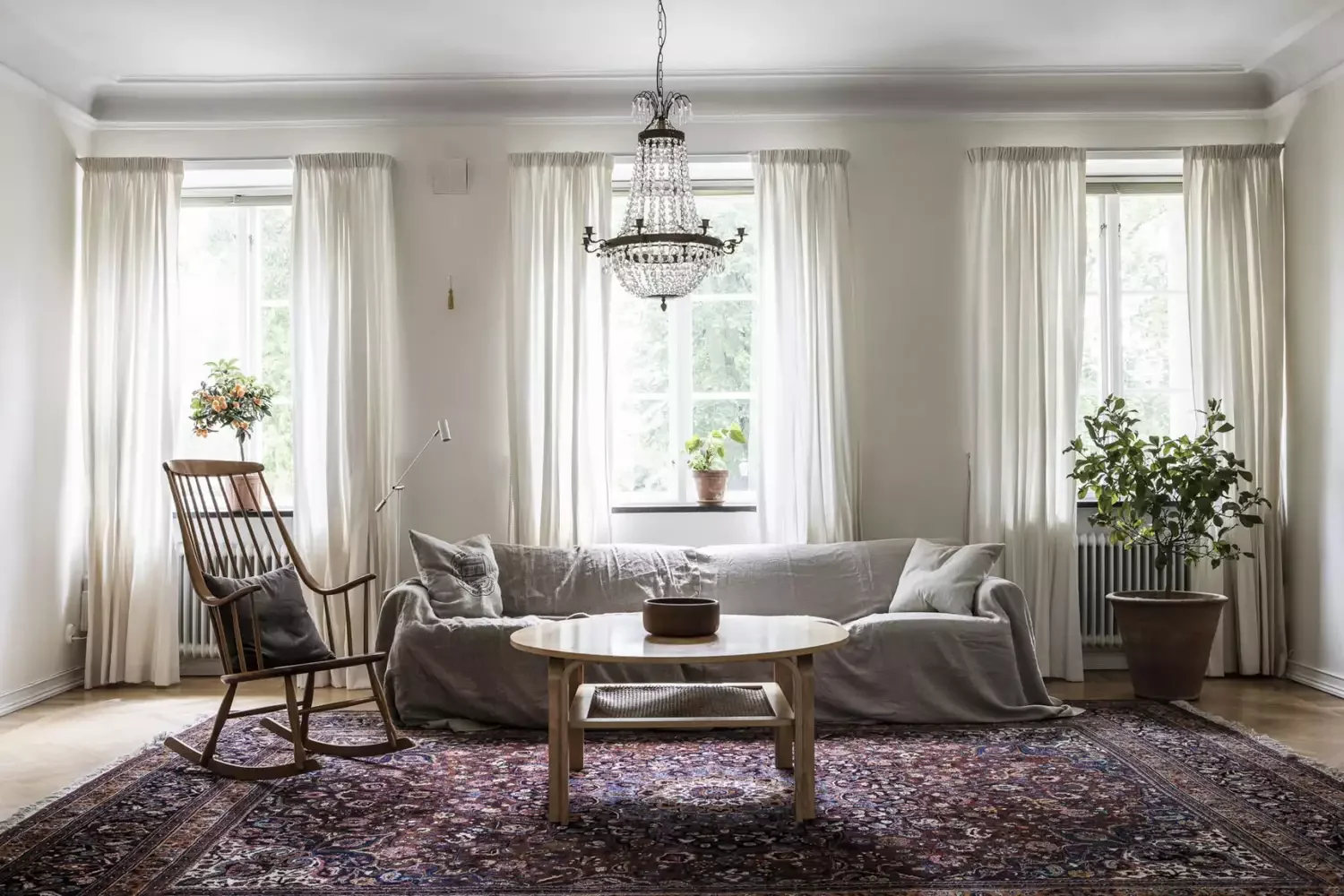 92 Living Room Styling Ideas That Will Transform Your Space Hang an Antique Chandelier
