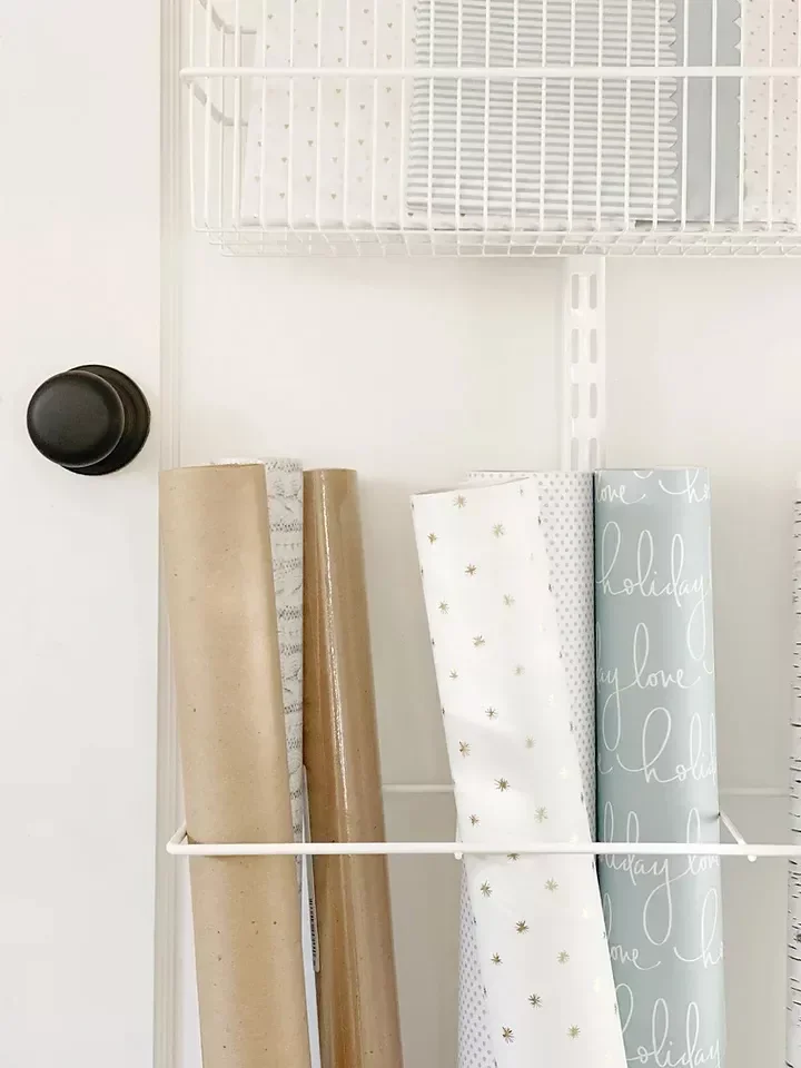 18 Creative Gift Wrap Storage Solutions That Banish Holiday Clutter Hang an Over-the-Door Organizer