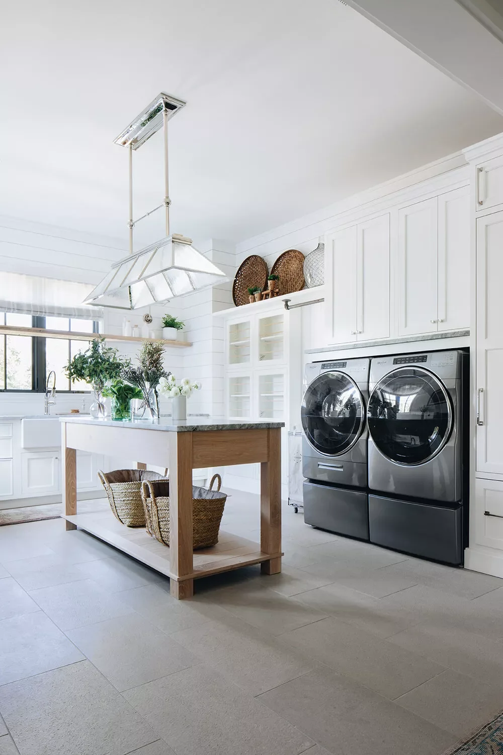 57 Creative Laundry Room Ideas That'll Make You Actually Enjoy Doing Chores Hang an Oversized Pendant
