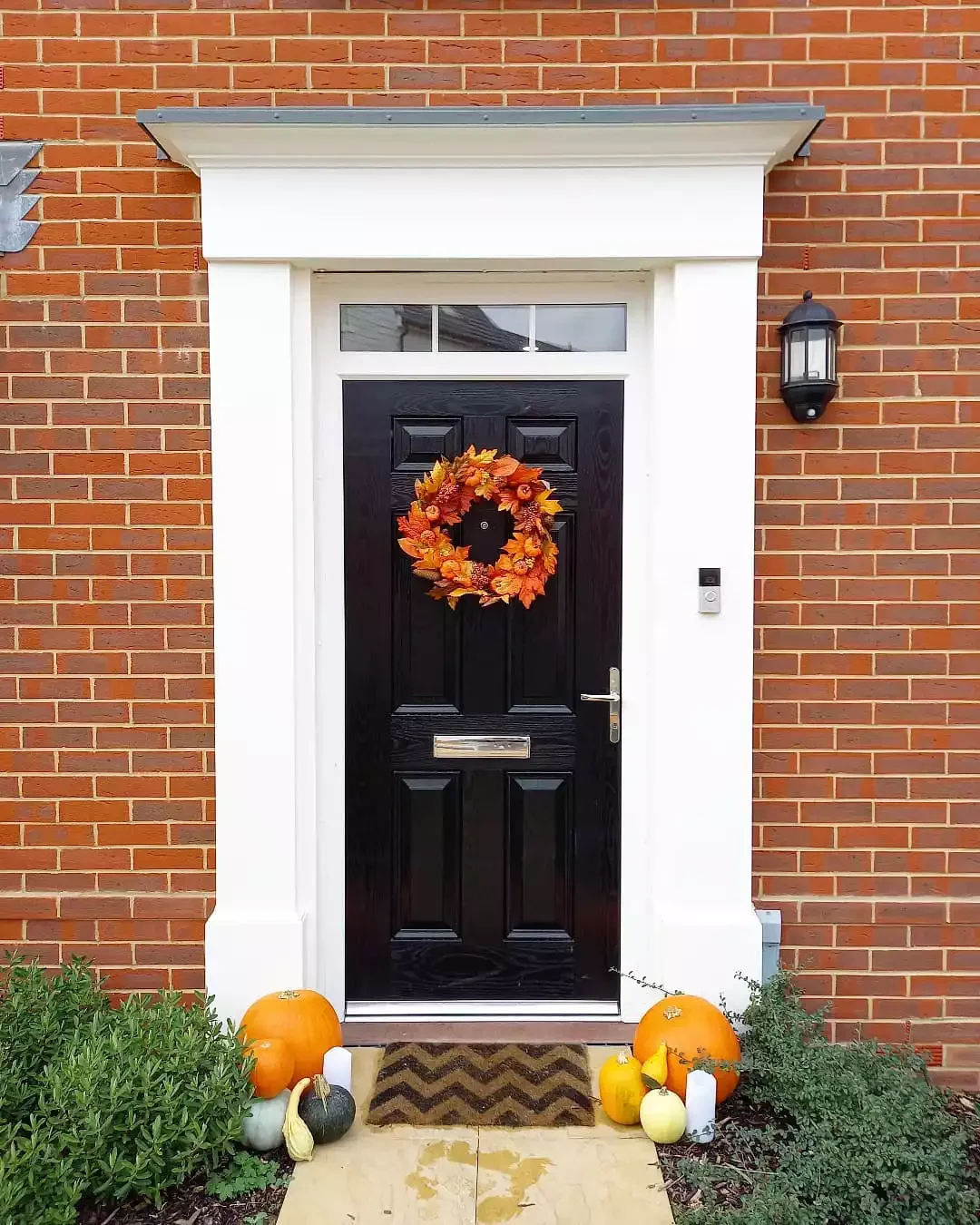 33 Stunning Black Front Door Ideas That Transform Your Home's Entrance Hang up a Bright Wreath