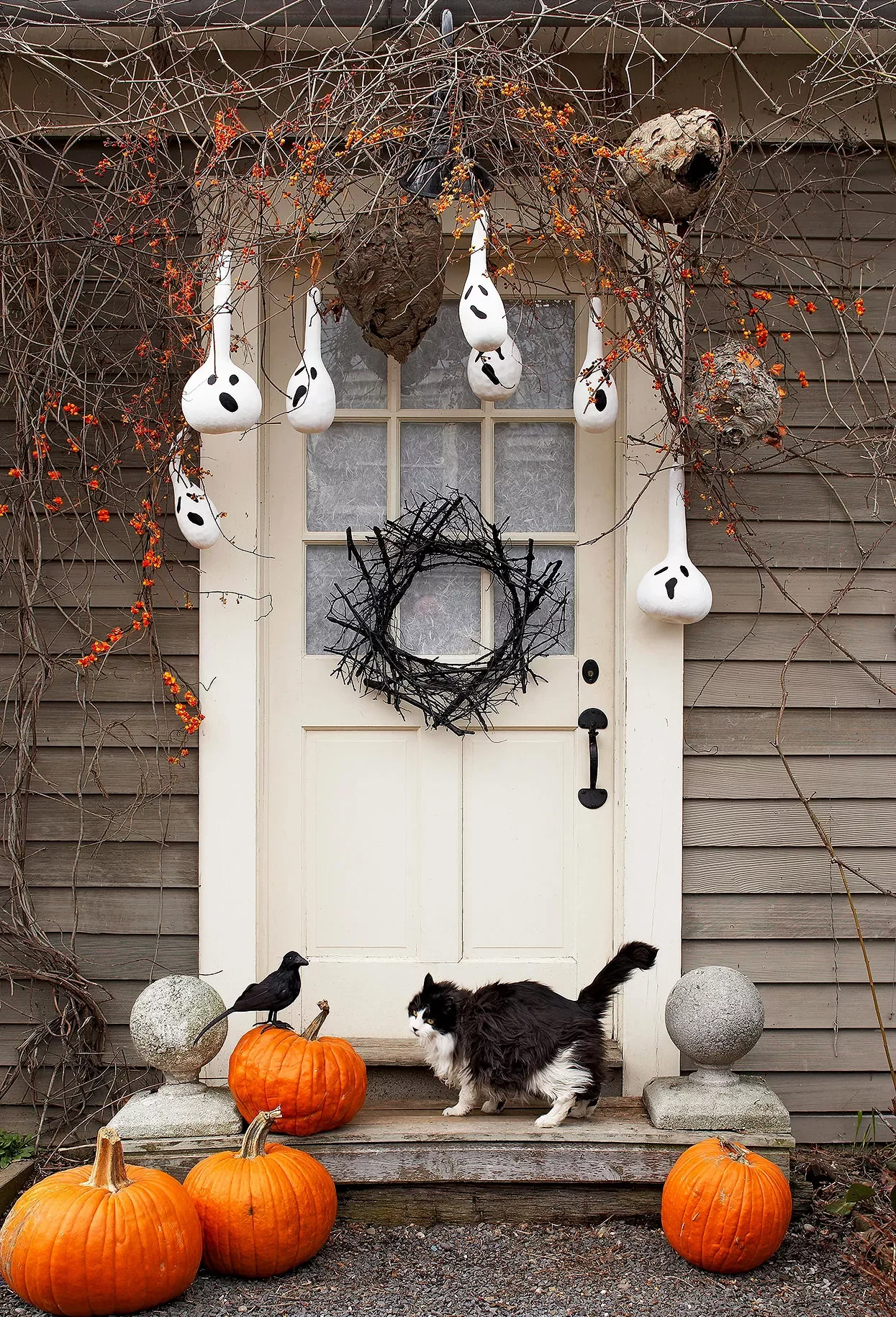 56 Creative DIY Halloween Decorations for Outdoor Spaces 48 Hanging Ghost Gourds