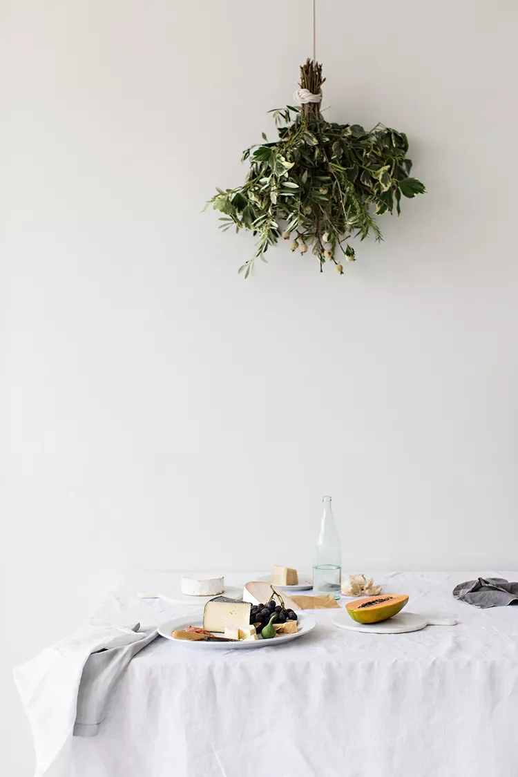 52 Gorgeous Spring Table Centerpiece Ideas to Transform Your Dining Space 32 Hanging Oversized Herb Bundle