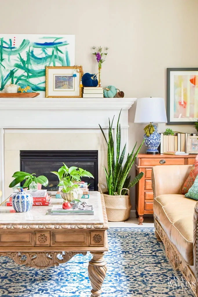 30 Enchanting Halloween Fireplace Mantel Ideas to Transform Your Space 12 Have Fun With Color