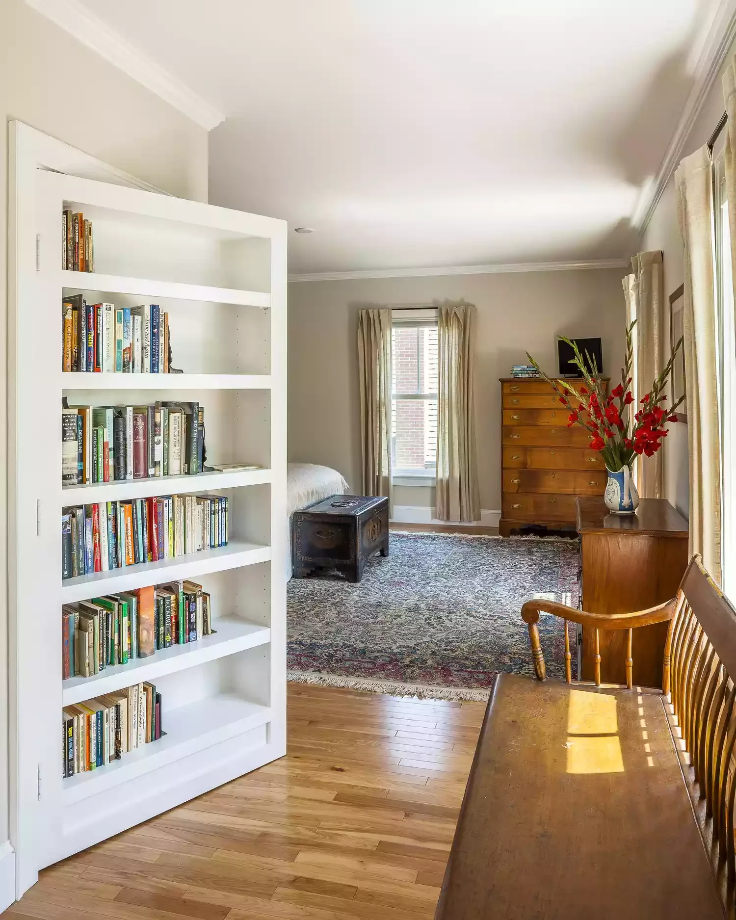 25 Clever Hidden Door Ideas That Add Mystery and Extra Storage to Your Home 4 Hide It With a Bookcase
