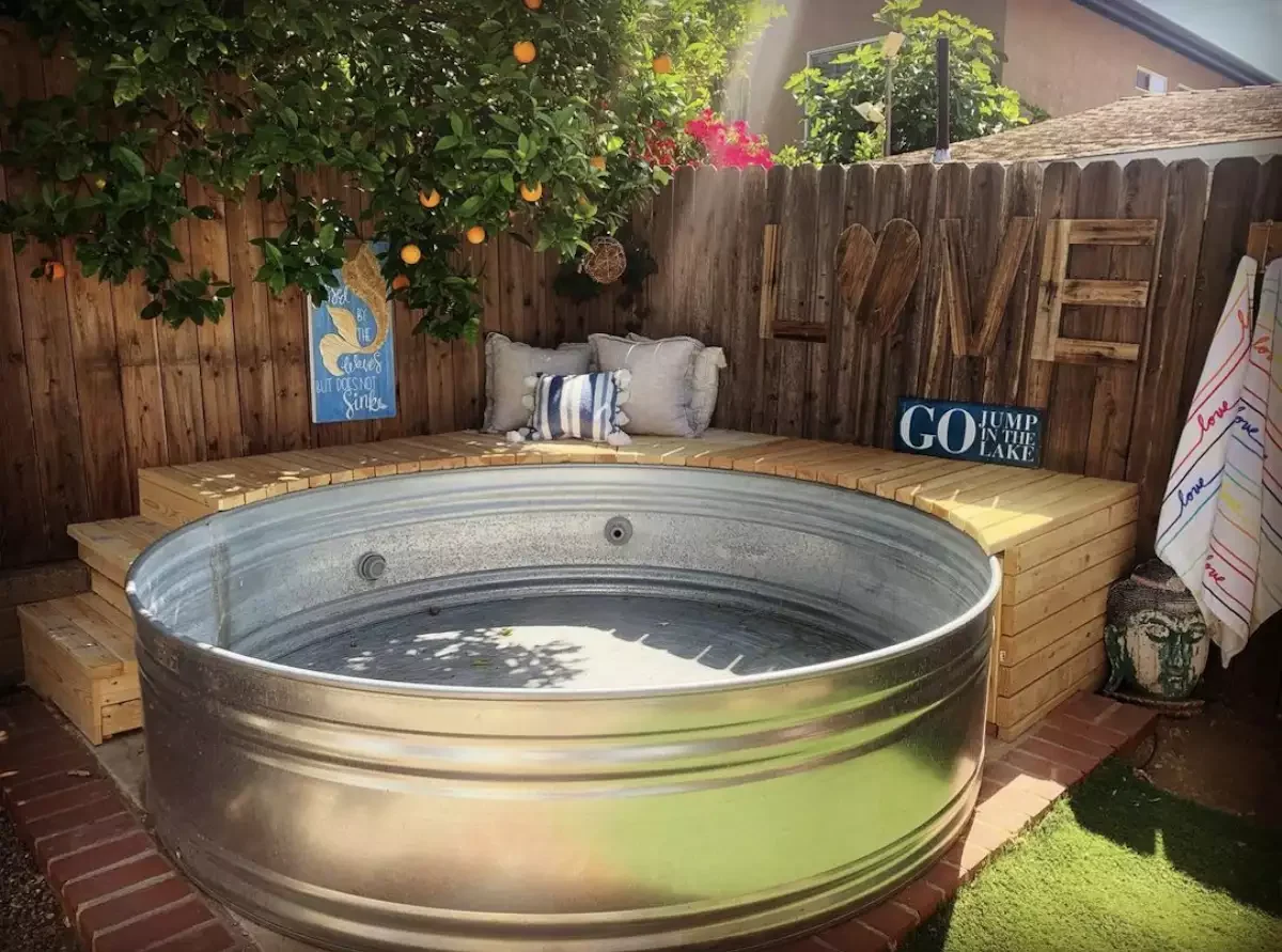 33 Creative Stock Tank Pool Ideas to Transform Your Backyard 16 Hide the Plumbing