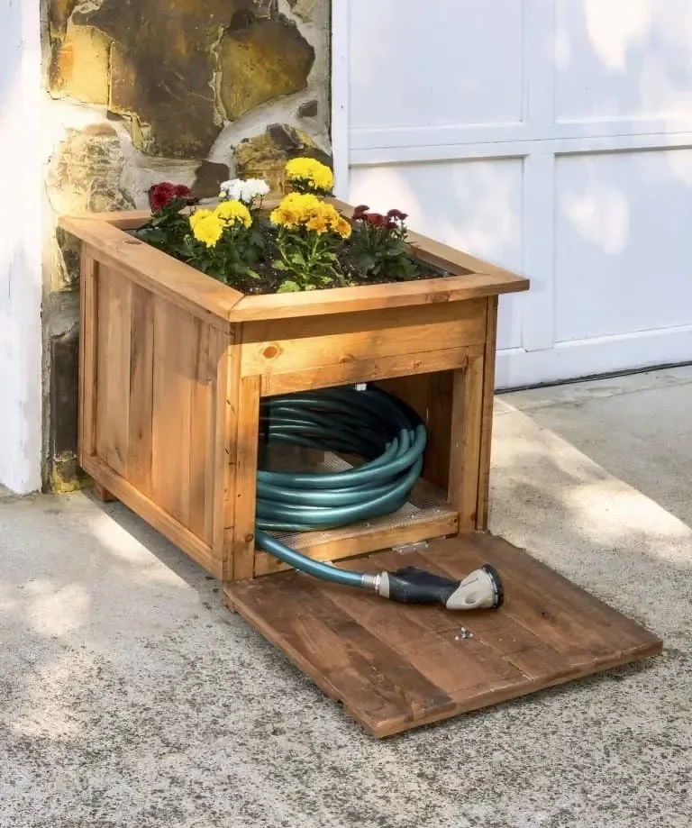 35 Creative DIY Garden Projects to Transform Your Outdoor Space Hose Holder With Pallet Wood Planter