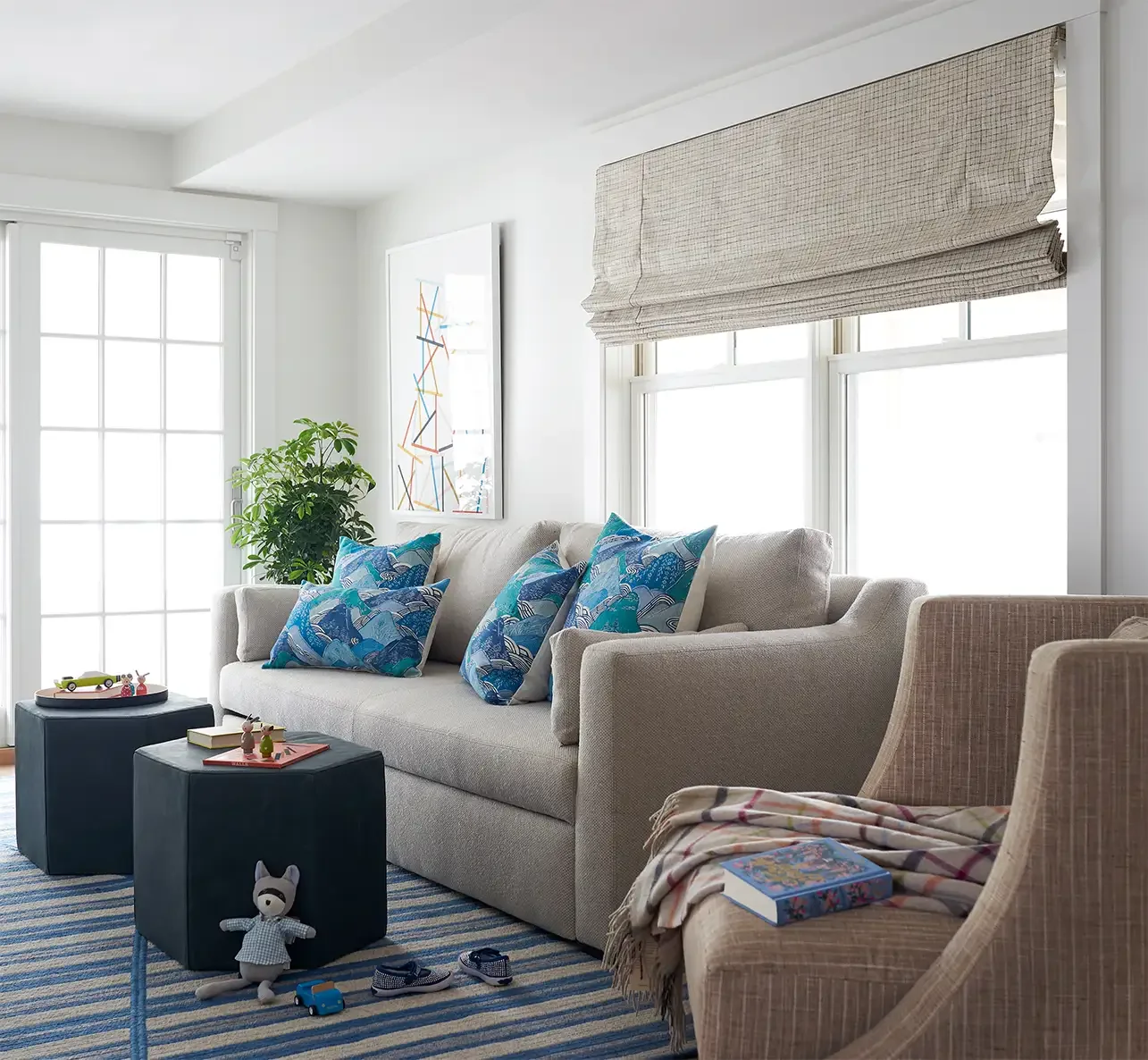 36 Clever Hidden Toy Storage Solutions That Keep Your Living Room Stylish In a Pair of Storage Ottomans