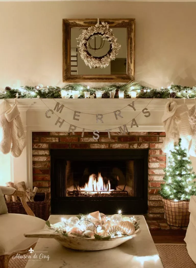 56 Magical Christmas Mantel Decorating Ideas to Transform Your Holiday Home 7 Include a Mini Tree
