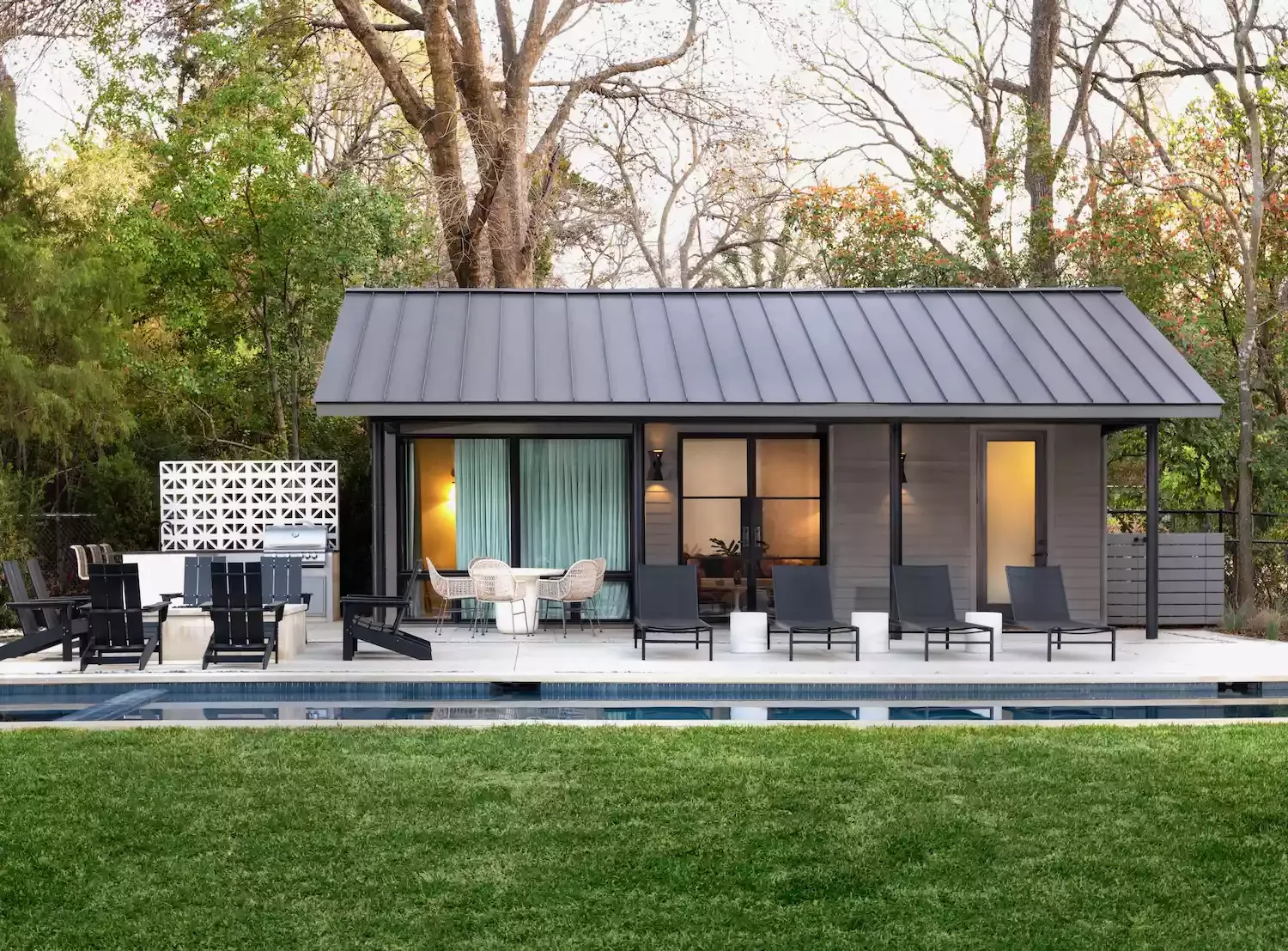 38 Stunning Pool House Ideas to Create Your Dream Backyard Retreat 12 Include a Pool House Patio