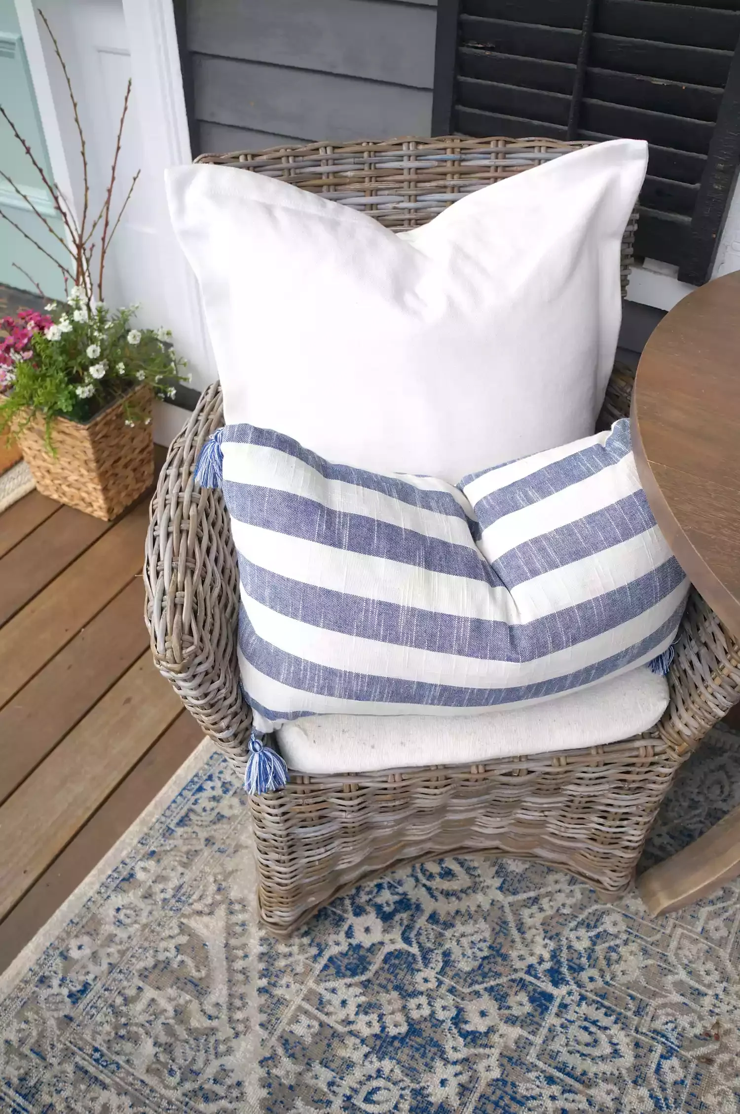 38 Charming Farmhouse Porch Ideas That Create the Perfect Welcome 27 Incorporate Color and Pattern