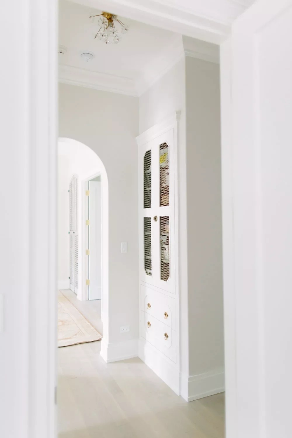 30 Smart Ways to Transform Your Narrow Hallway Into a Stylish Space 28 Incorporate Custom Built-Ins