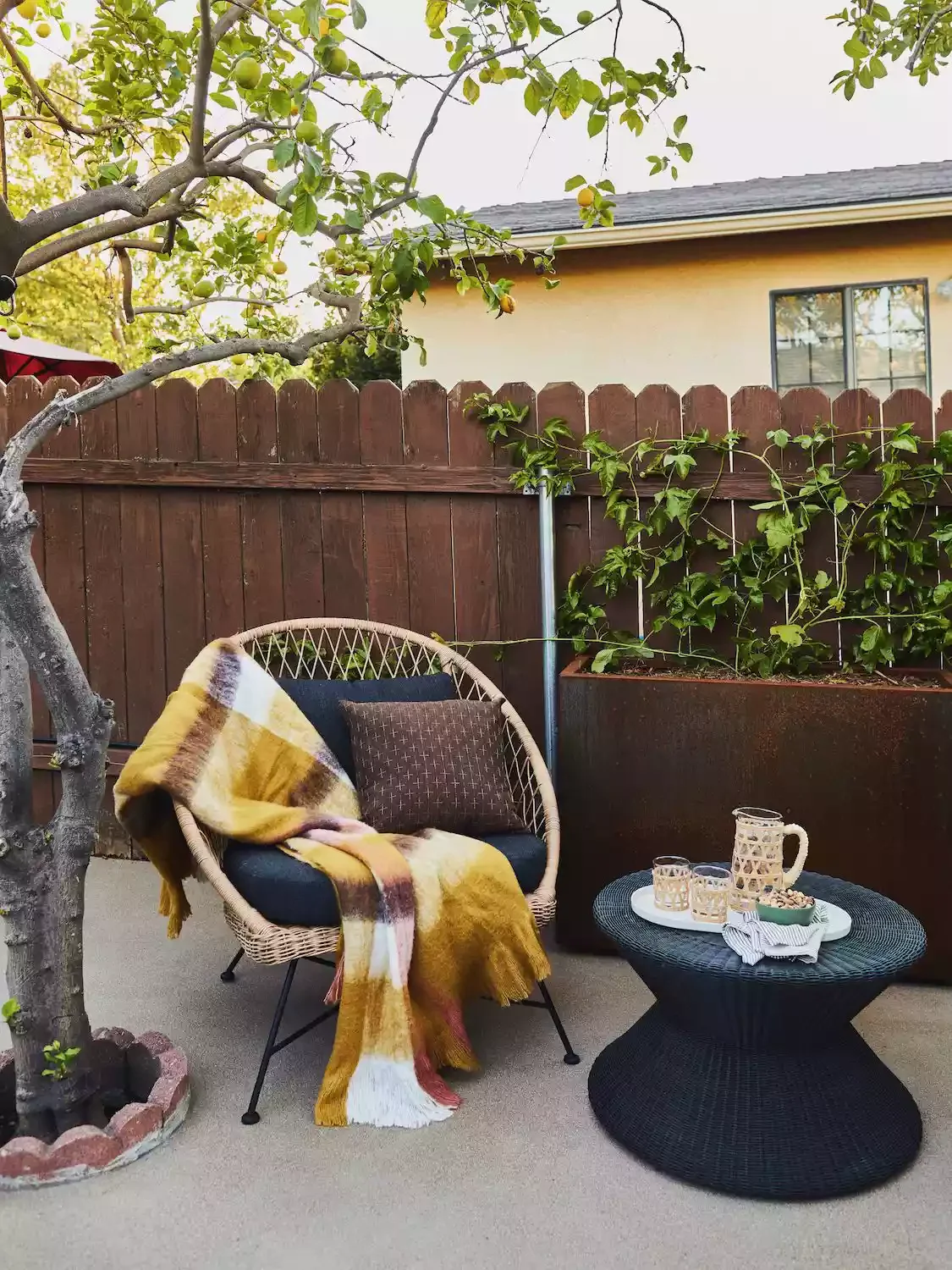 30 Budget-Friendly Ways to Transform Your Concrete Patio 12 Incorporate Nature