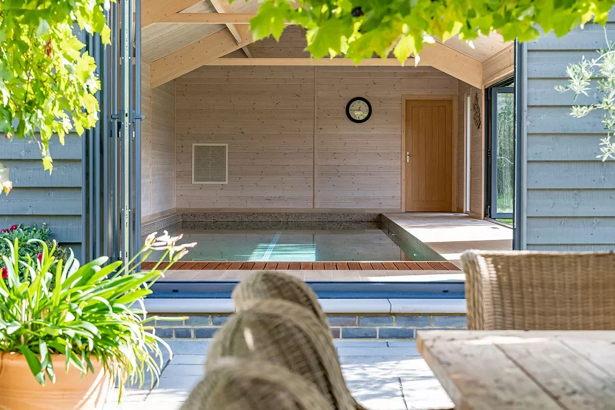 75 Stunning Backyard Pool Ideas That Will Transform Your Outdoor Space 34 Indoor-Outdoor Backyard Pool