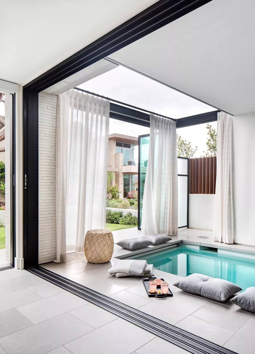 37 Stunning Plunge Pool Designs to Transform Your Backyard Into a Cool Summer Retreat 1 Indoor-Outdoor Plunge Pool
