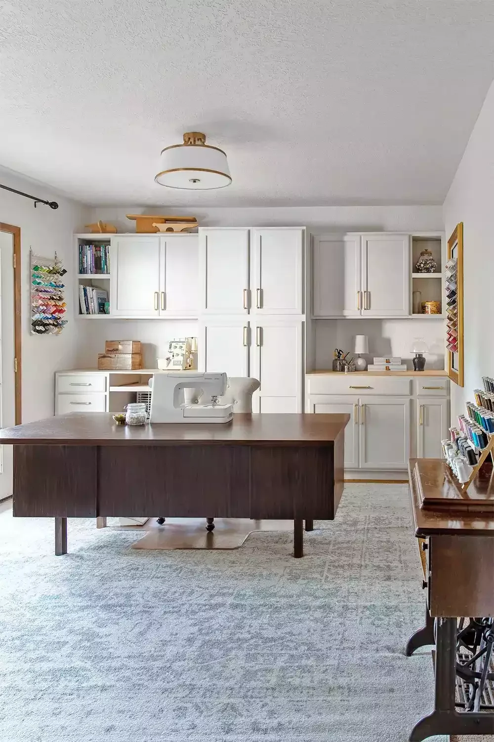 15 Creative Sewing Room Ideas to Transform Your Craft Space Install Floor-to-Ceiling Cabinets