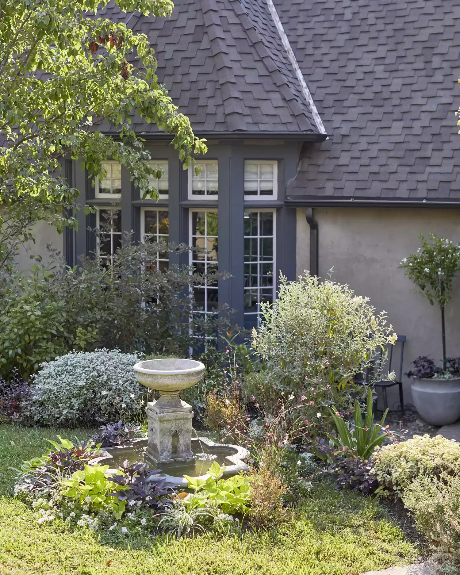 60 Garden Decor Ideas That Transform Your Outdoor Space Install a Classic Fountain
