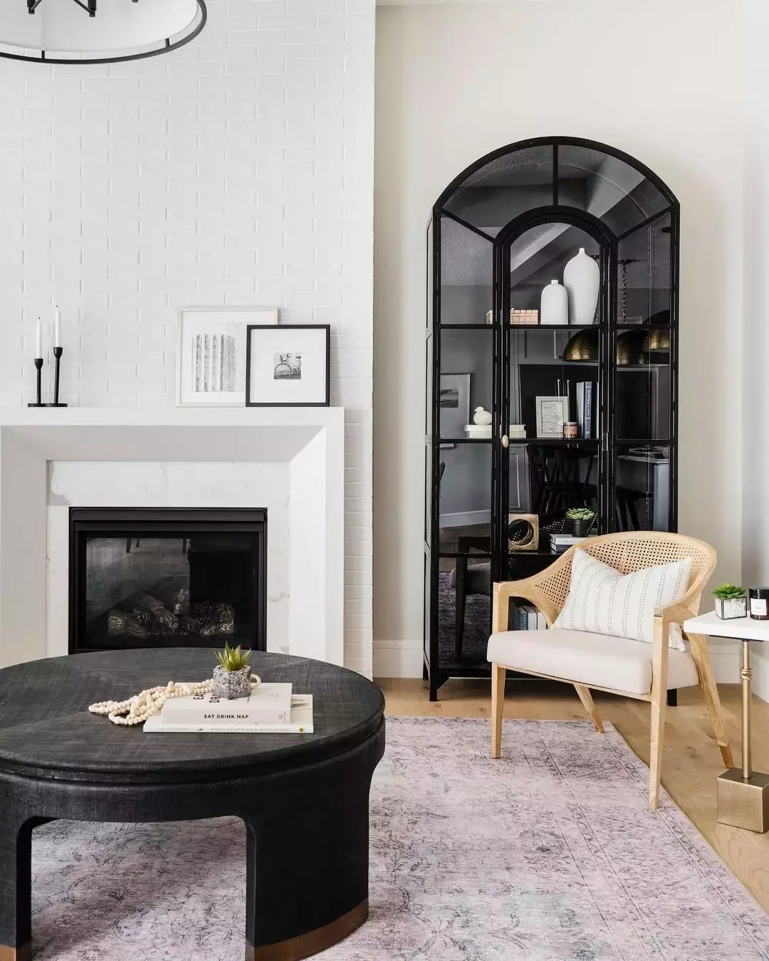 30 Stunning Black and White Living Room Ideas That Will Transform Your Space 16 Install a Curio Cabinet