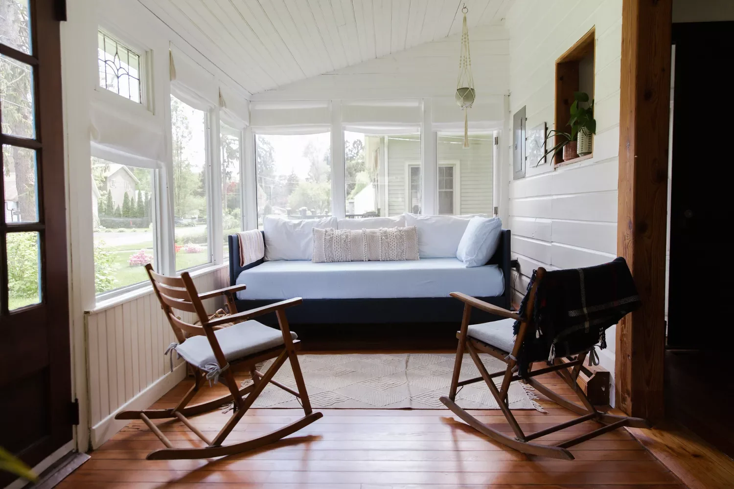 50 Stunning Sunroom Ideas That Transform Your Home Into a Light-Filled Paradise 6 Install a Daybed