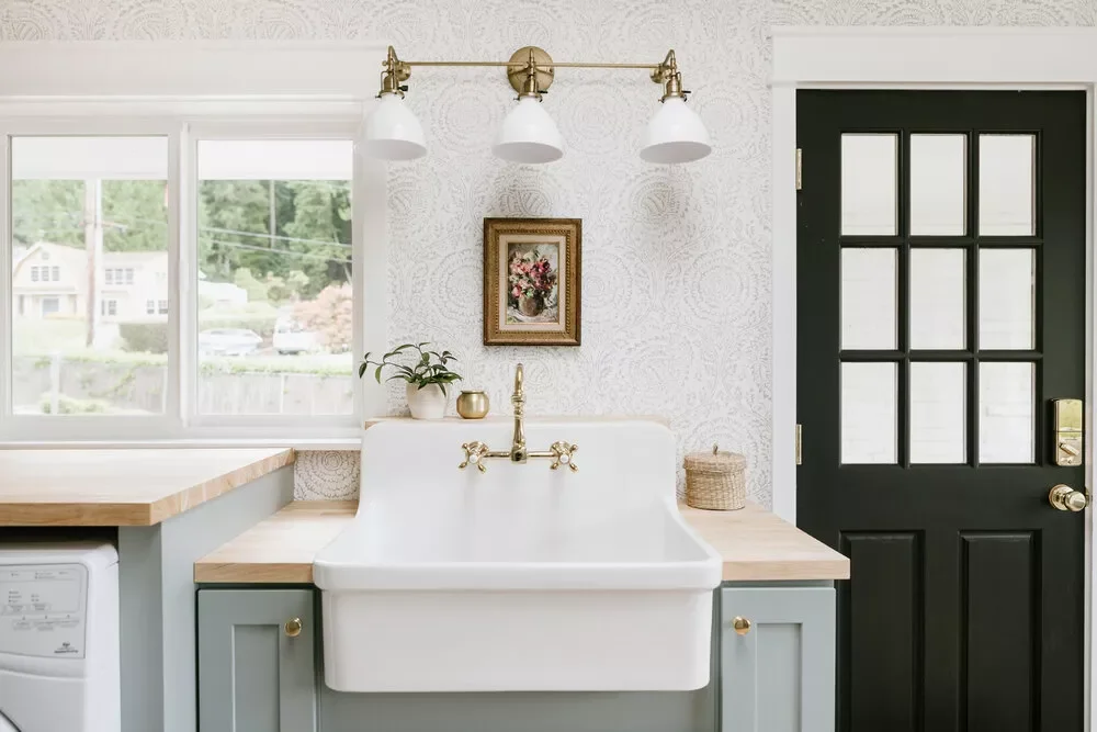 57 Creative Laundry Room Ideas That'll Make You Actually Enjoy Doing Chores Install a Farmhouse Sink