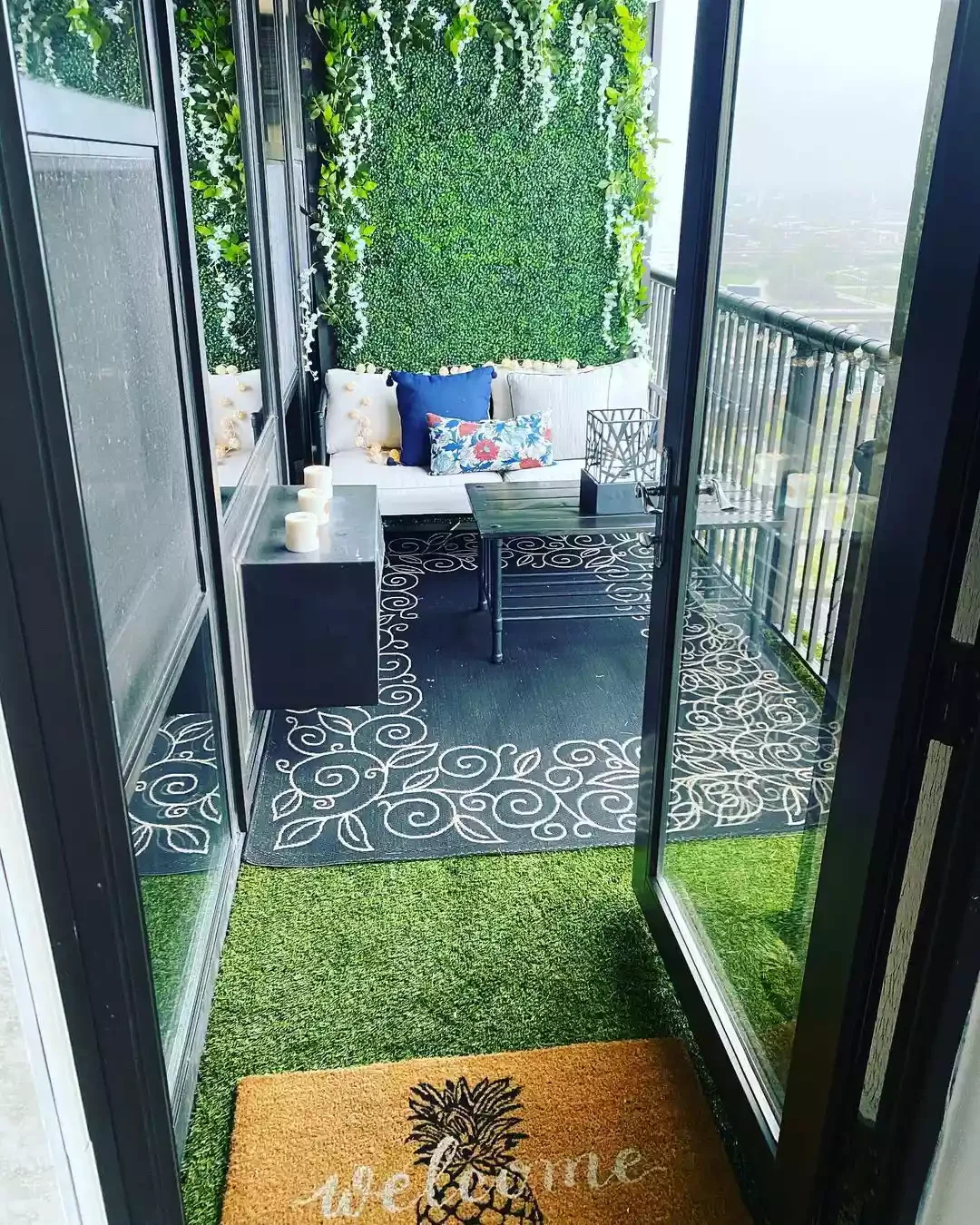 22 Creative Ways to Add Privacy to Your Balcony Space 5 Install a Faux Greenery Wall