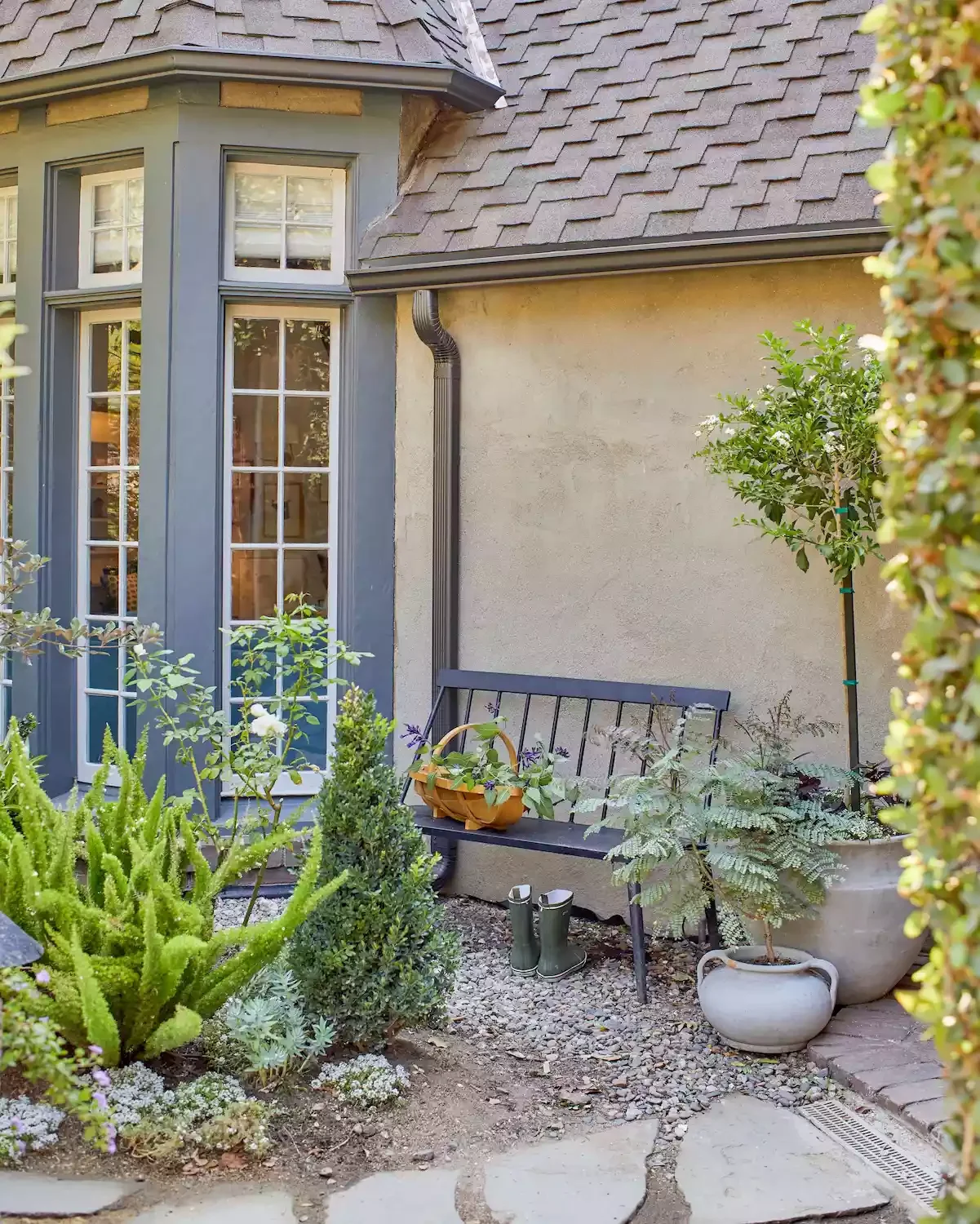 25 Front Patio Ideas That Transform Into an Inviting Haven Install a Garden Bench
