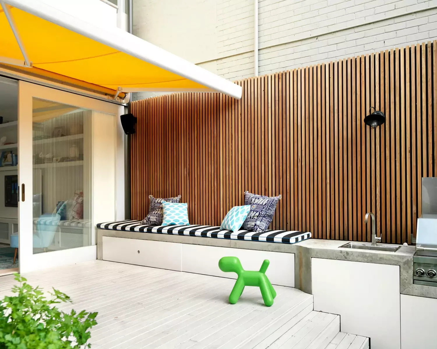 24 Stunning Covered Deck Ideas That Transform Your Outdoor Living Space 18 Install a Retractable Awning