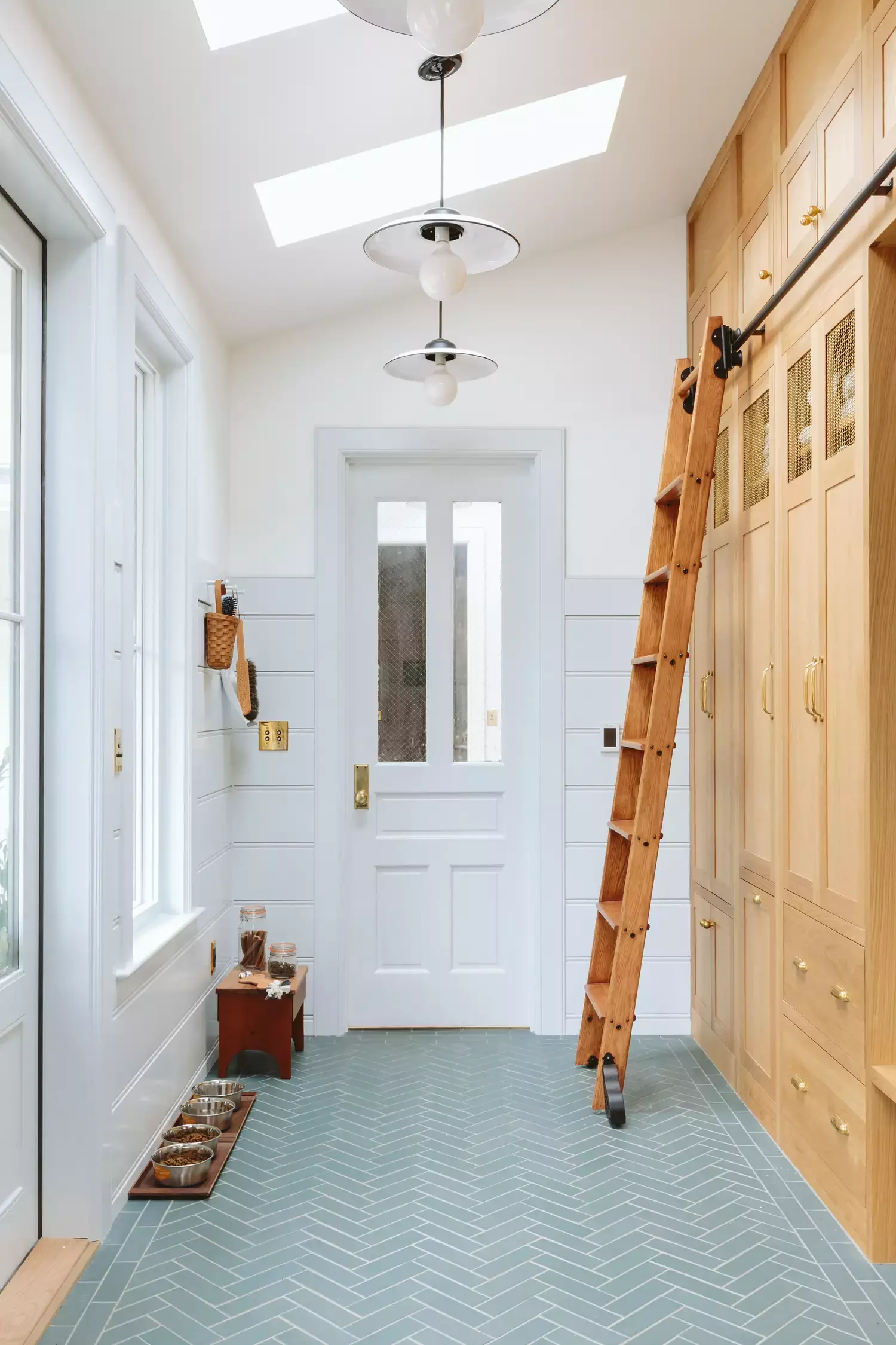 30 Smart Ways to Transform Your Narrow Hallway Into a Stylish Space 21 Install a Rolling Ladder