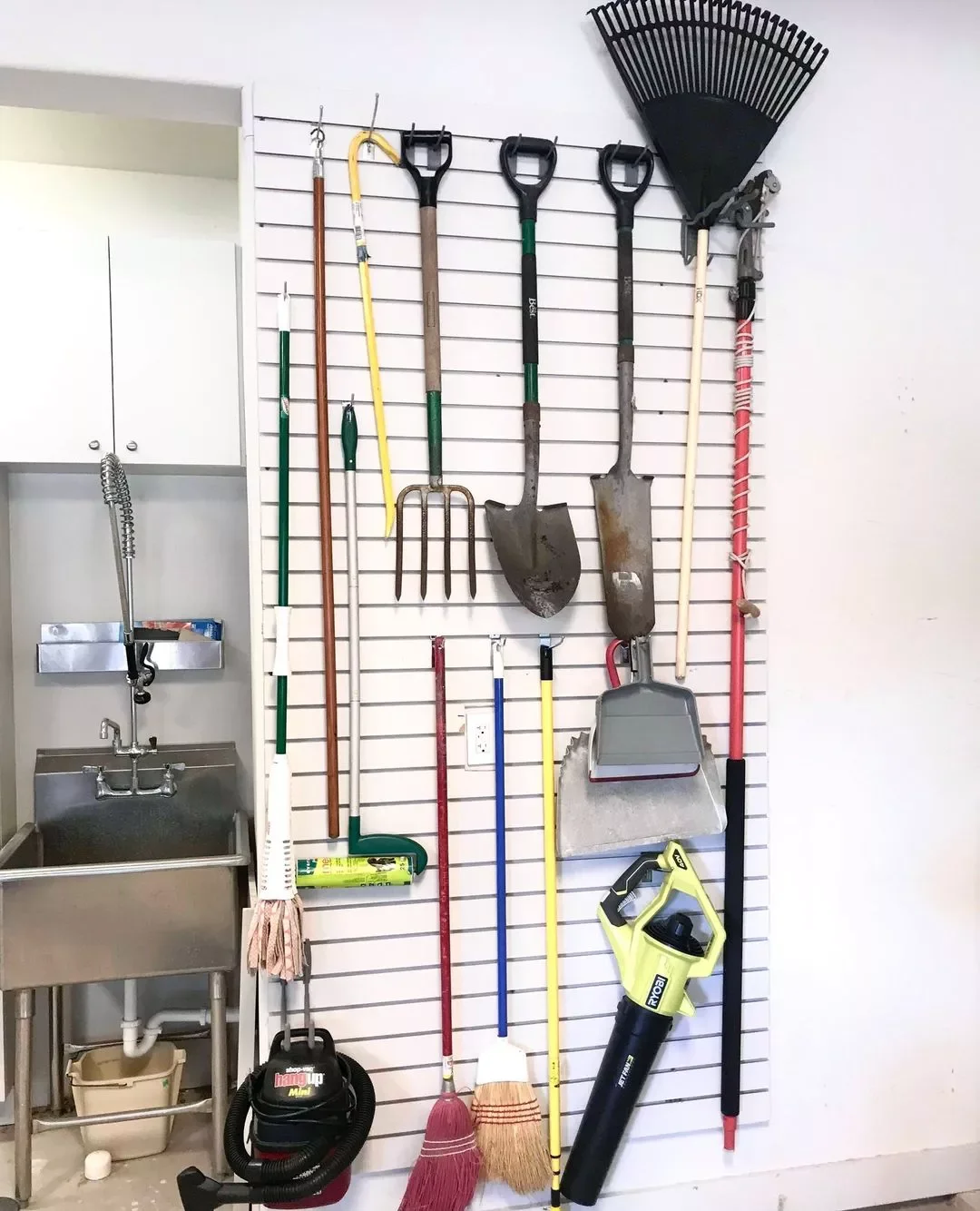 20 Clever Ways to Store Your Mops and Brooms Like a Pro Install a Slat Wall