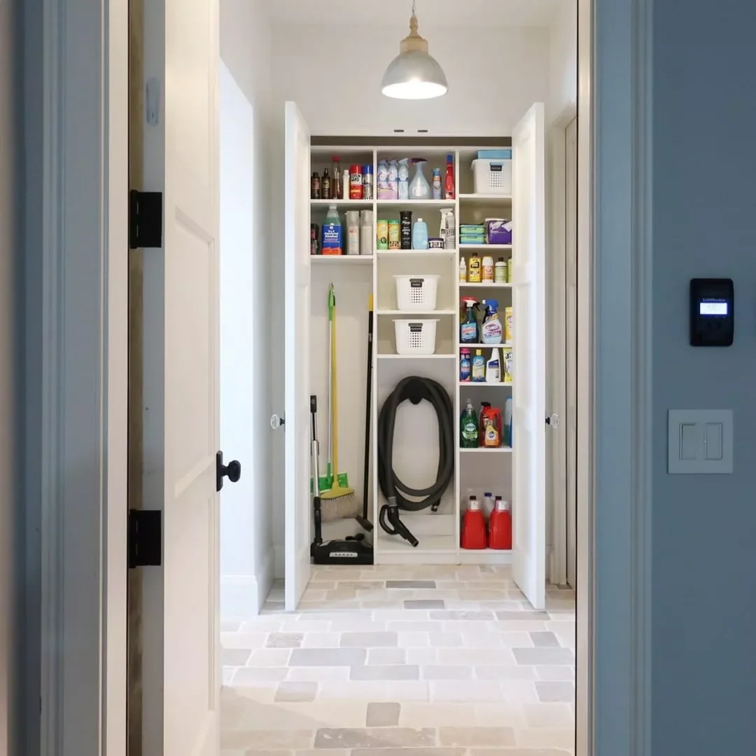 20 Clever Ways to Store Your Mops and Brooms Like a Pro Install a Stand-Alone Cabinet for Cleaning Supplies