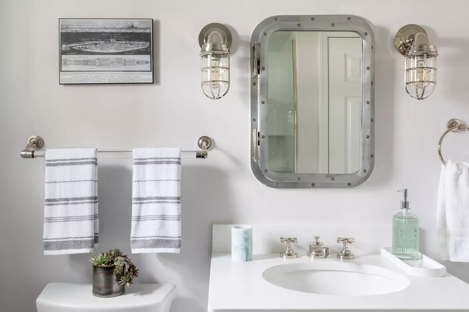 20 Budget-Friendly Ideas to Transform Your Small Bathroom 16 Install a Statement Mirror