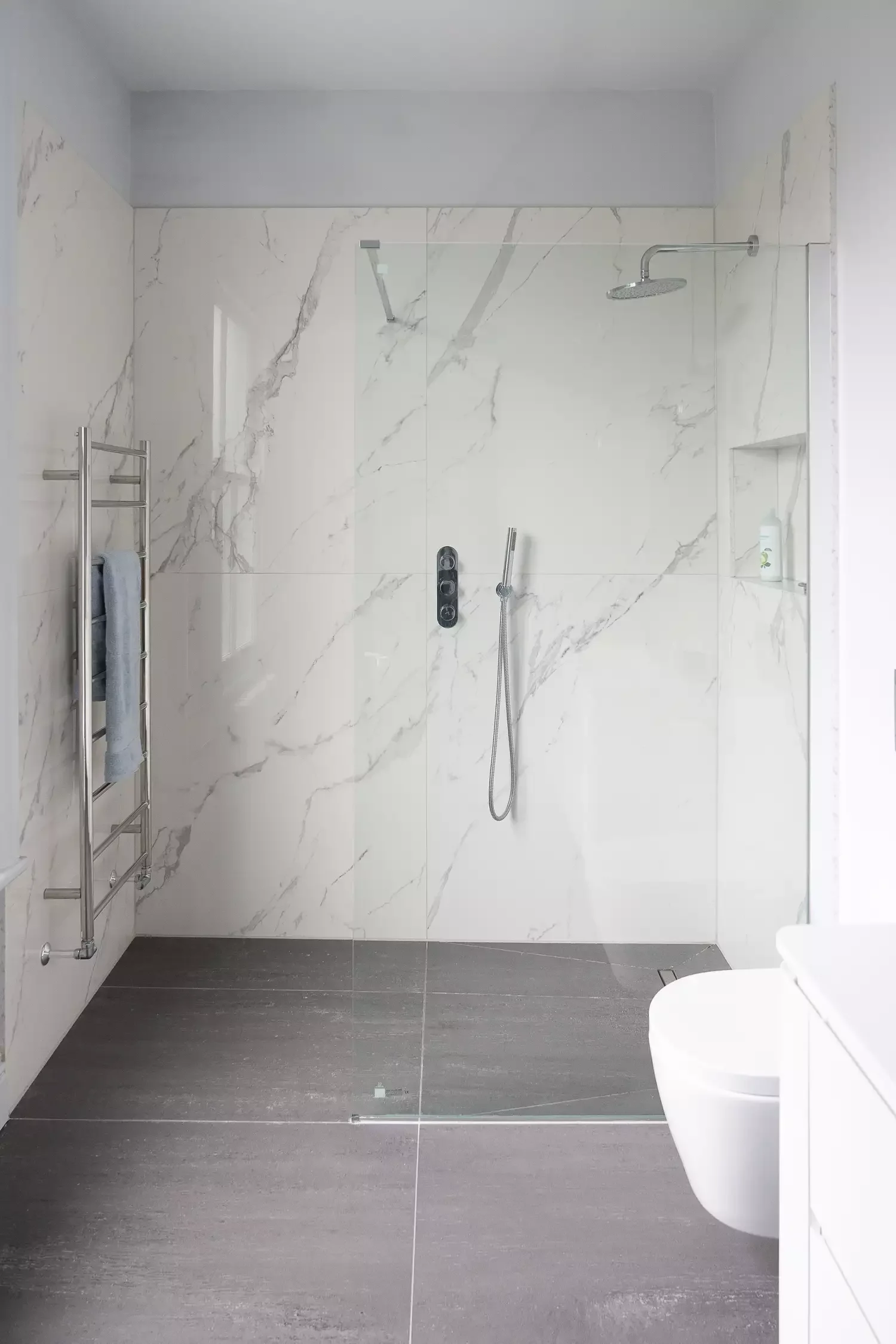 19 Brilliant Shower Storage Solutions That'll Transform Your Bathroom Install a Towel Rack Inside the Shower