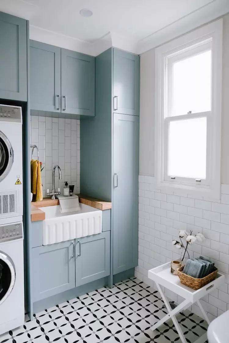 55 Small Laundry Room Ideas That Blend Style With Smart Functionality Install a Vertical Tile Backsplash