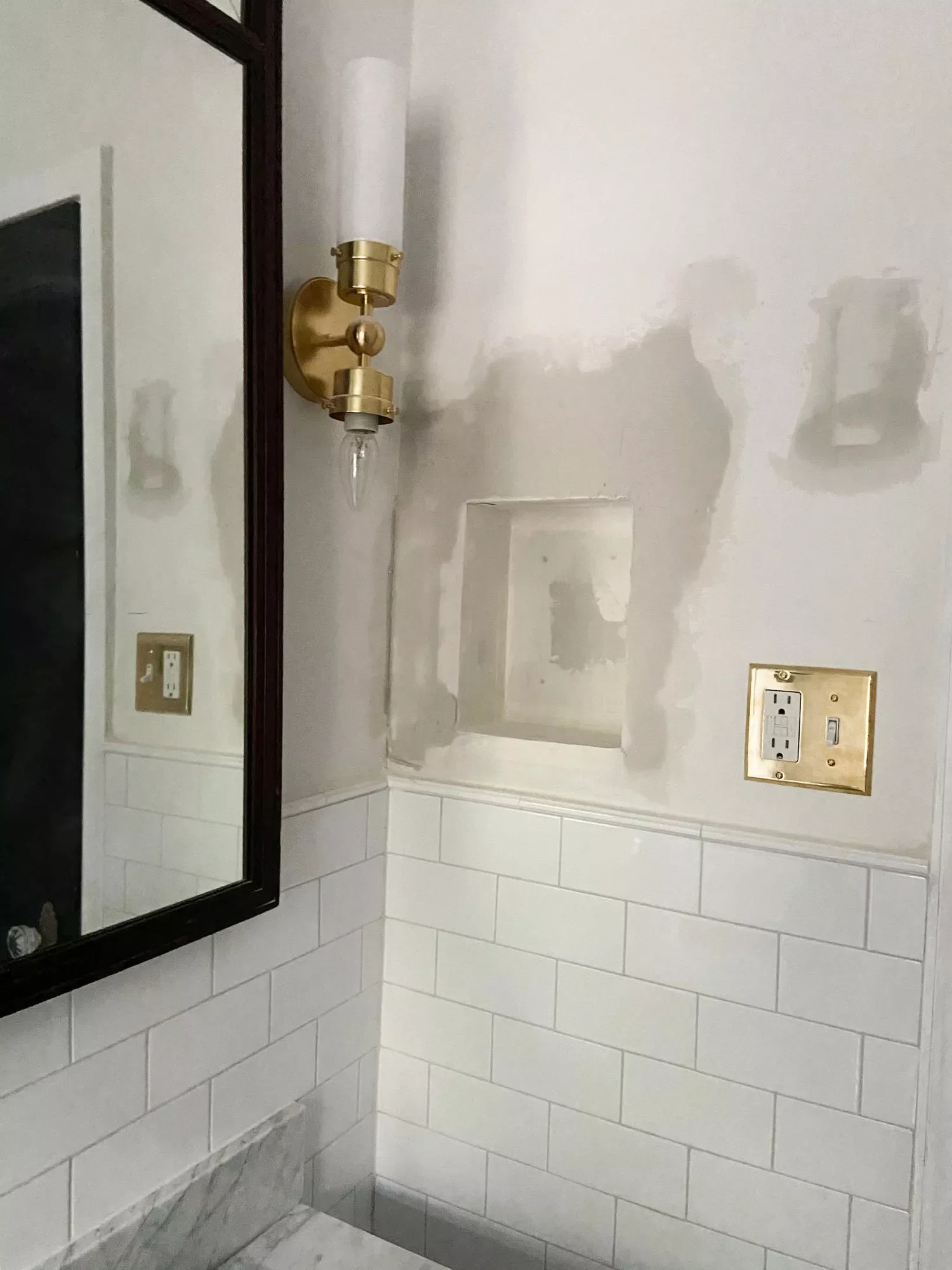 22 DIY Bathroom Makeover Ideas That Won't Break Your Budget 8 Install a Wall Niche