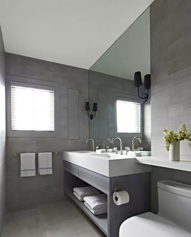 50 Dramatic Dark Bathroom Ideas to Transform Your Space 30 Install the Same Tile on the Walls and Floor
