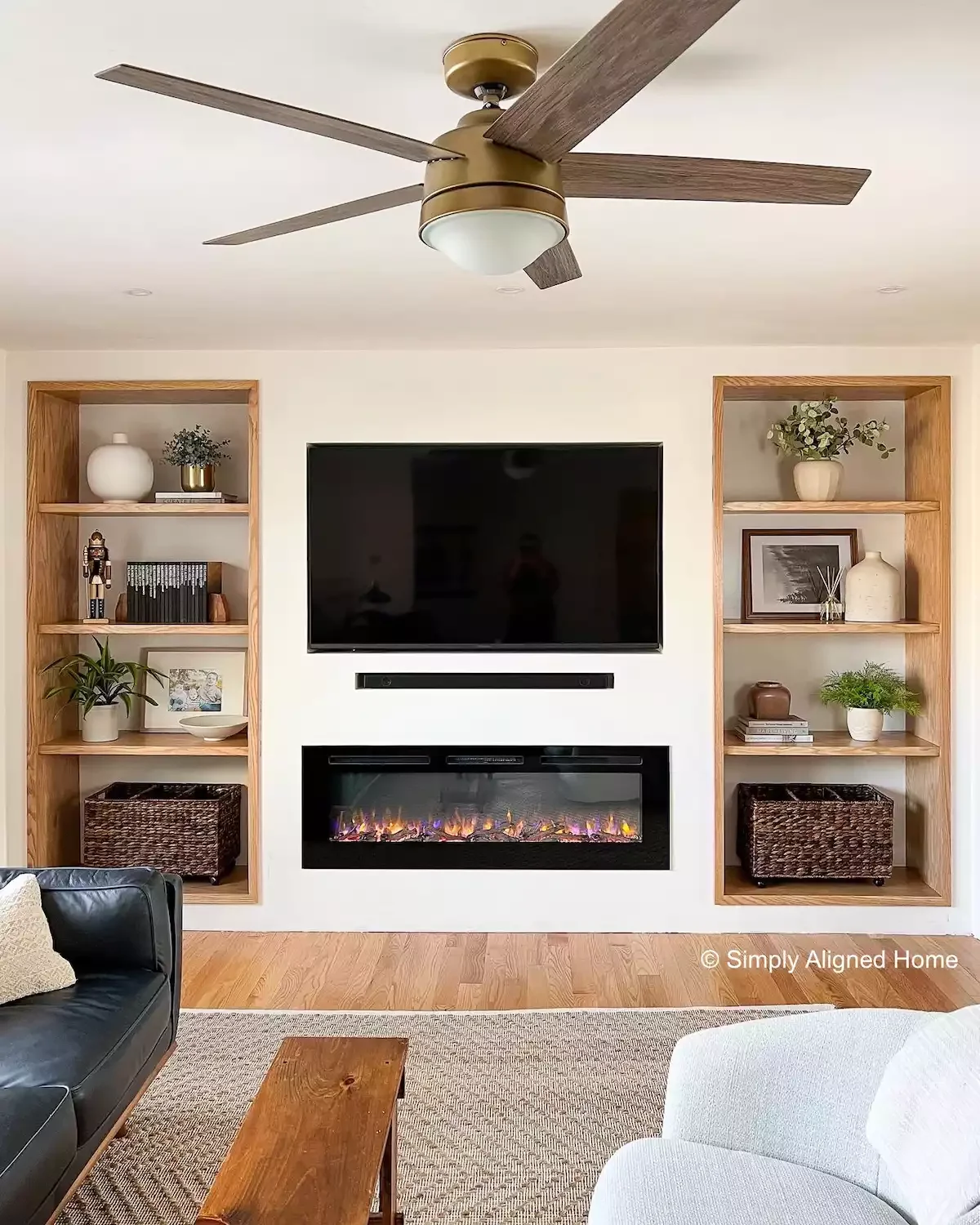 25 Stunning Electric Fireplace and TV Combinations That Look Professionally Designed 6 Integrate a Soundbar