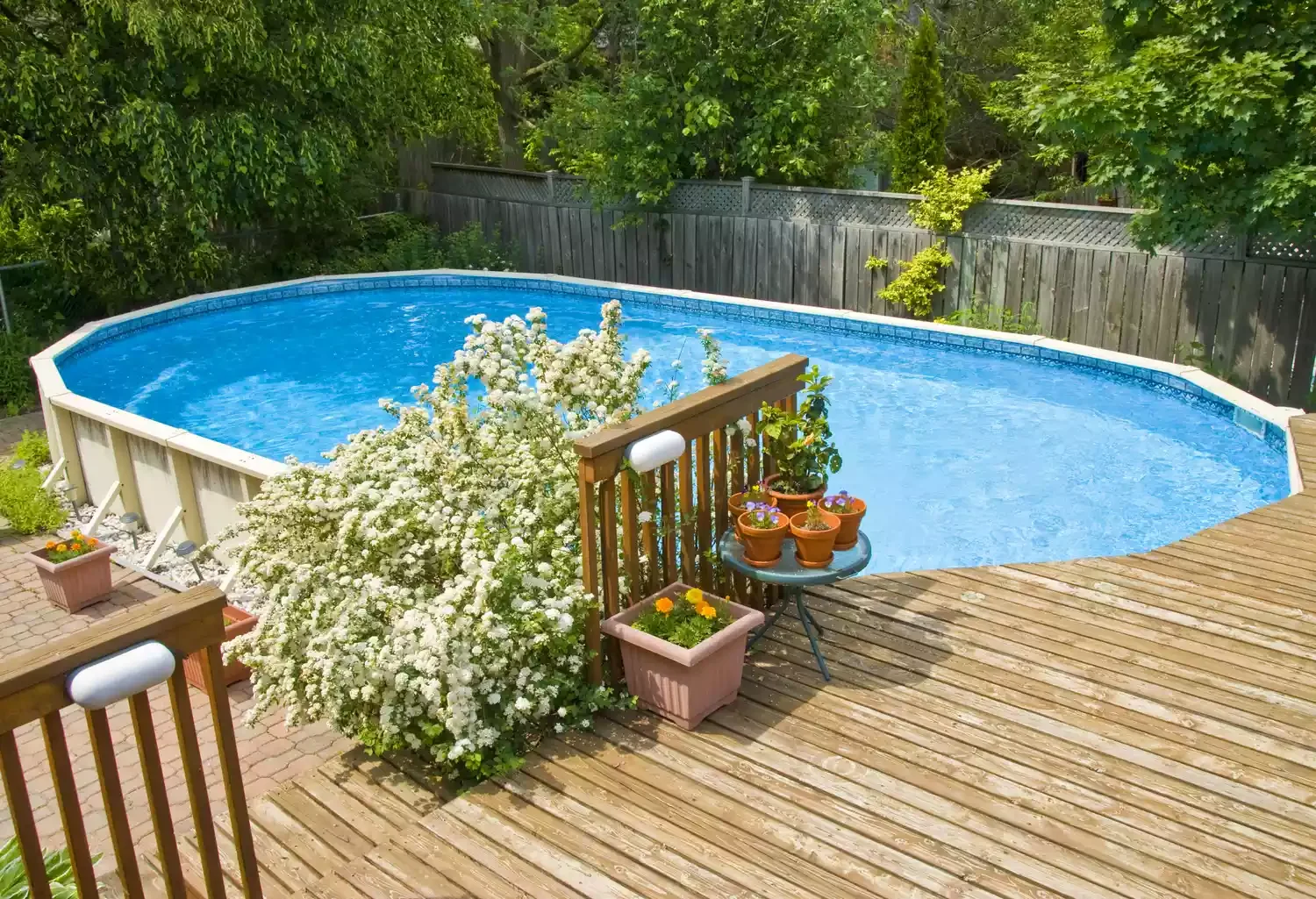 37 Brilliant Above-Ground Pool Deck Ideas That Won't Break Your Budget 7 Integrate the Deck Into Your Existing Deck