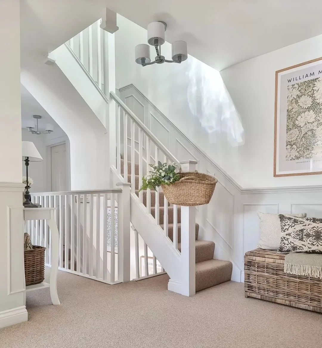 24 Creative Staircase Landing Decorating Ideas to Transform Your Space 13 Keep Odds and Ends Hidden
