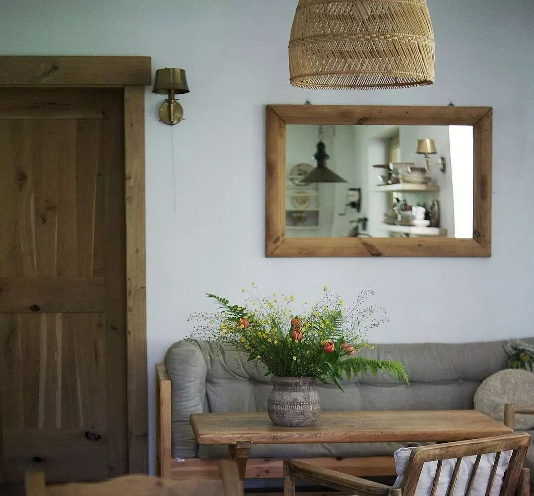 40 Cozy Country Living Room Ideas That Create Instant Warmth 17 Keep Wood Doors and Trim Natural