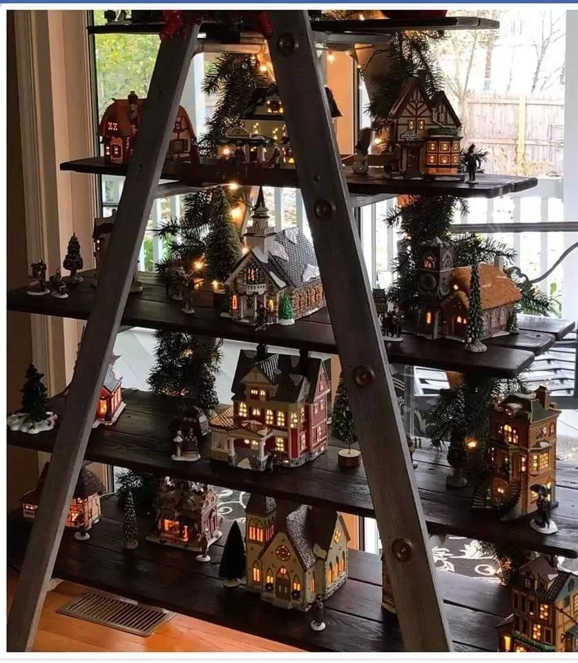 20 Magical Christmas Village Display Ideas That Will Transform Your Home Into a Winter Wonderland 9 Ladder Display