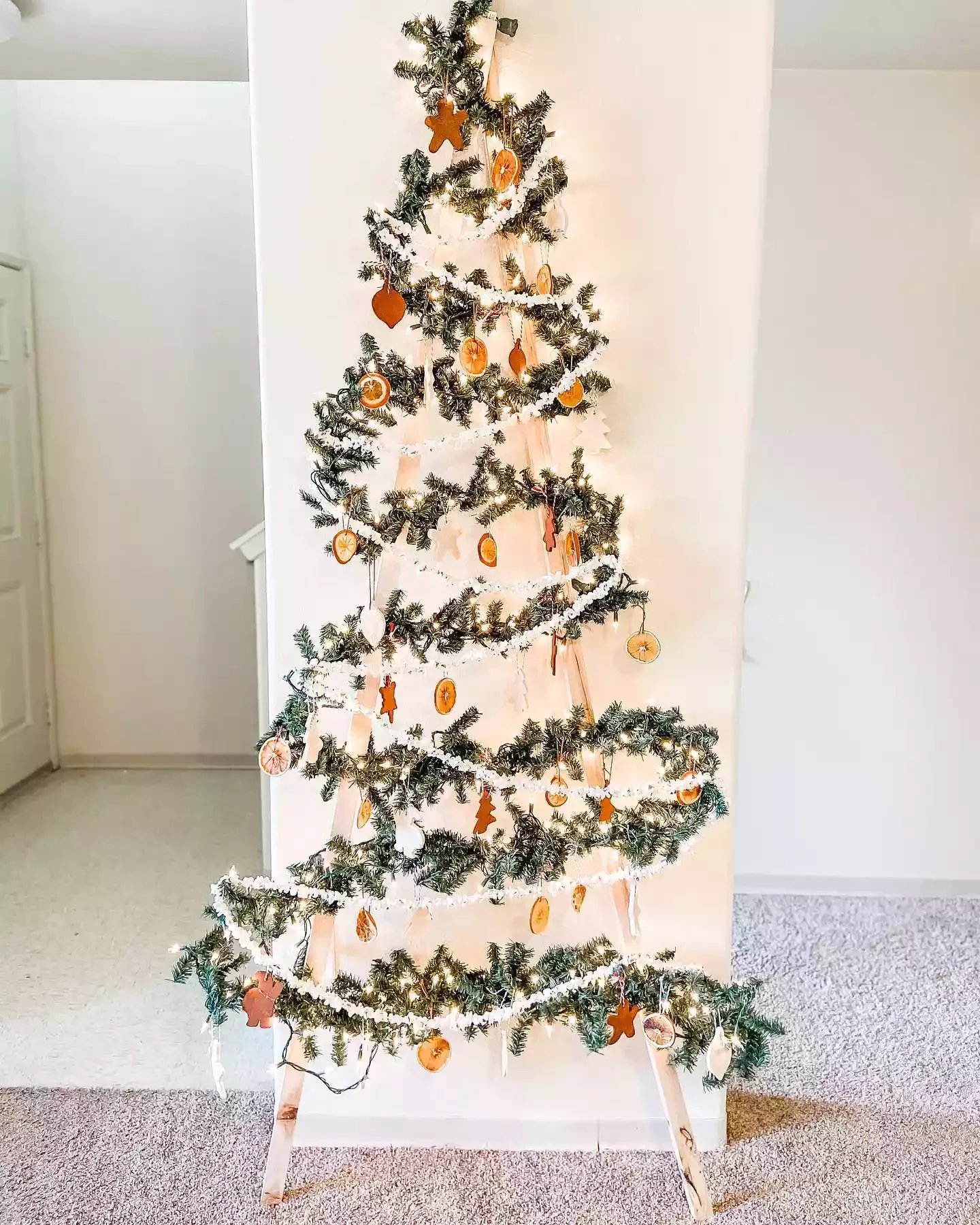 43 DIY Christmas Tree Ideas That Will Wow Your Holiday Guests Ladder Tree and Lush Garden