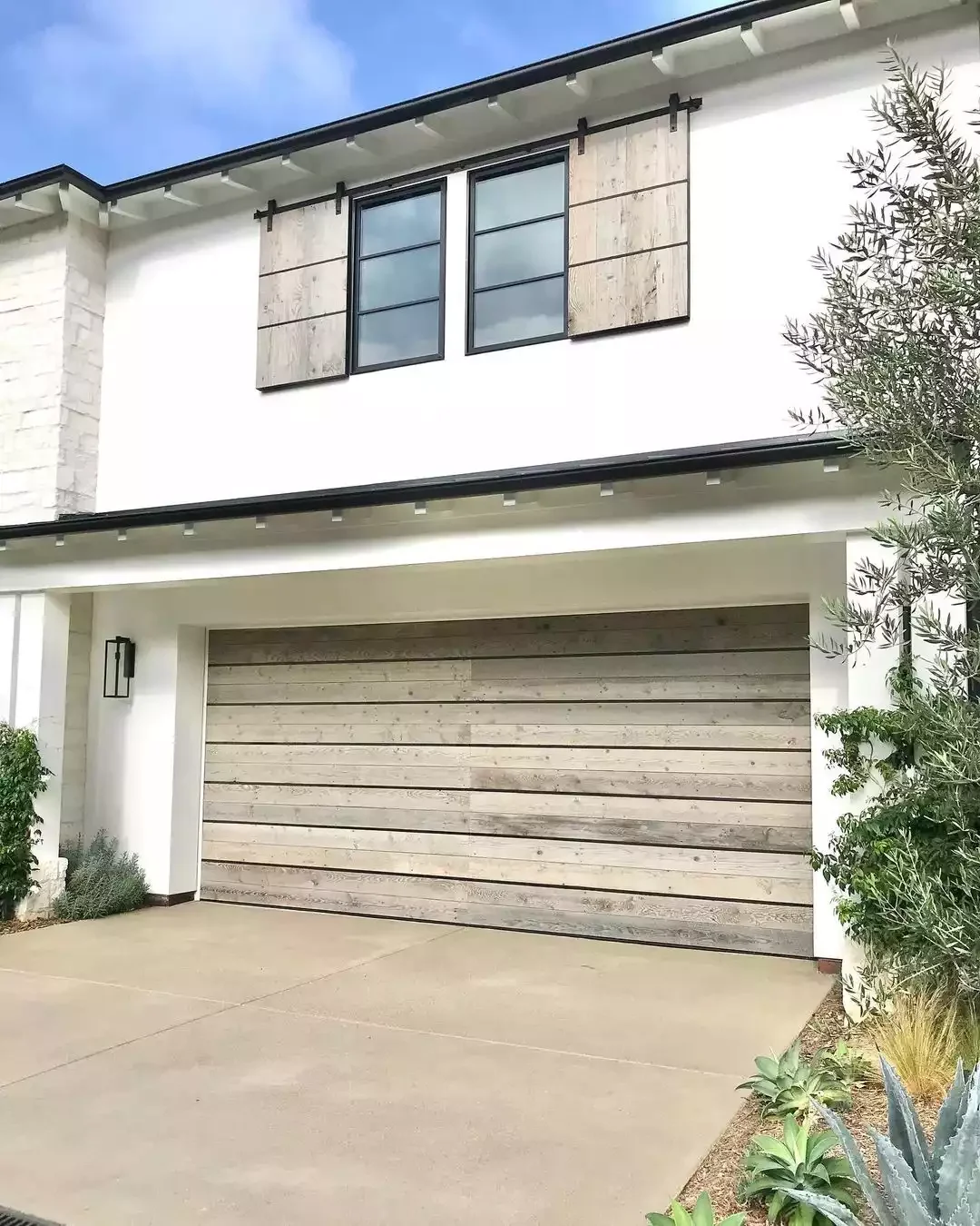 52 Stunning Garage Door Ideas That Will Transform Your Home's Curb Appeal Large Horizontal Wood Roll-Up