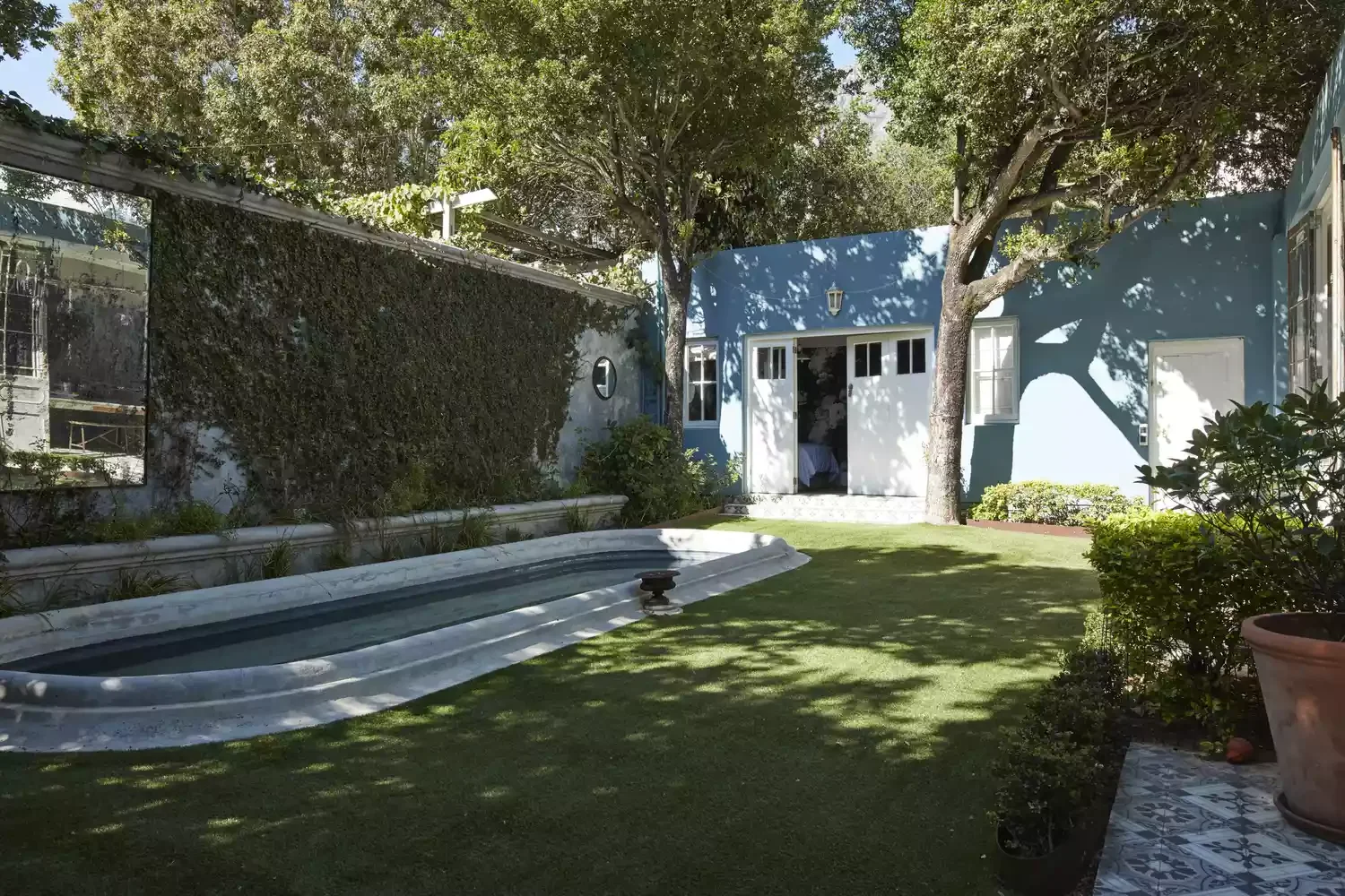 26 Beautiful Pool Barrier Ideas to Transform Your Backyard 21 Large Mirrors and Greenery