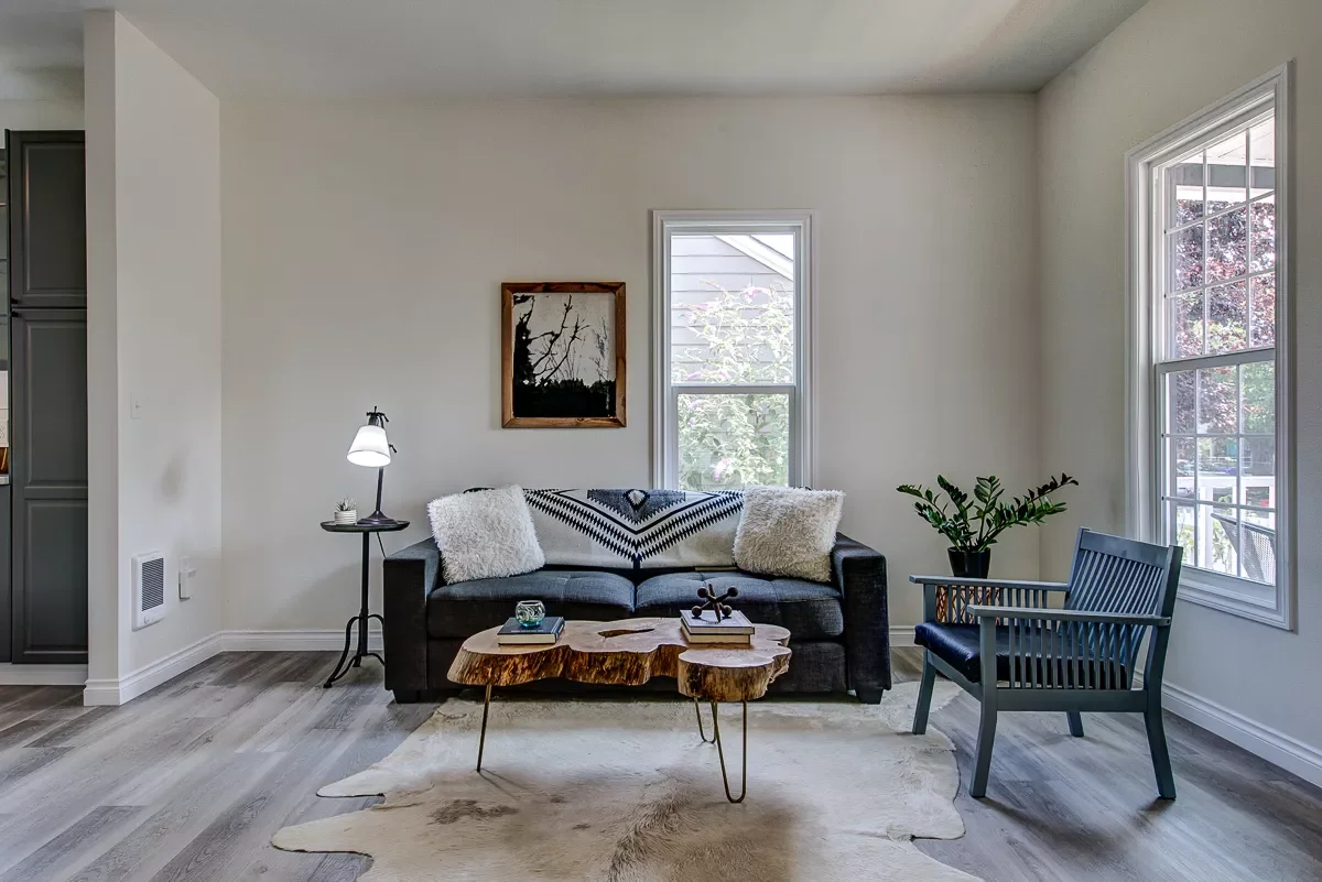 23 Stunning Gray Couch Living Room Ideas That Transform Your Space 5 Lay Out a Blanket