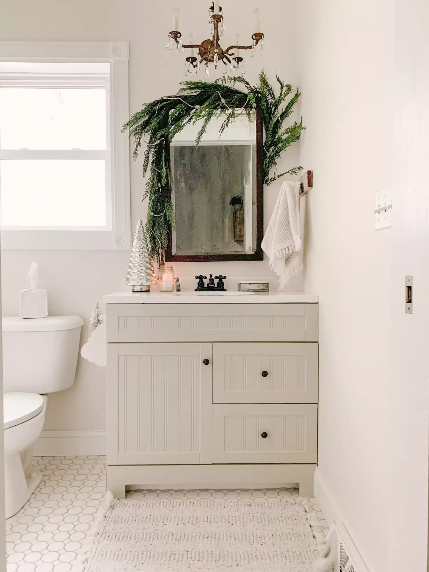 32 Christmas Bathroom Ideas That Create a Holiday Wonderland Layer Mirror Garlands